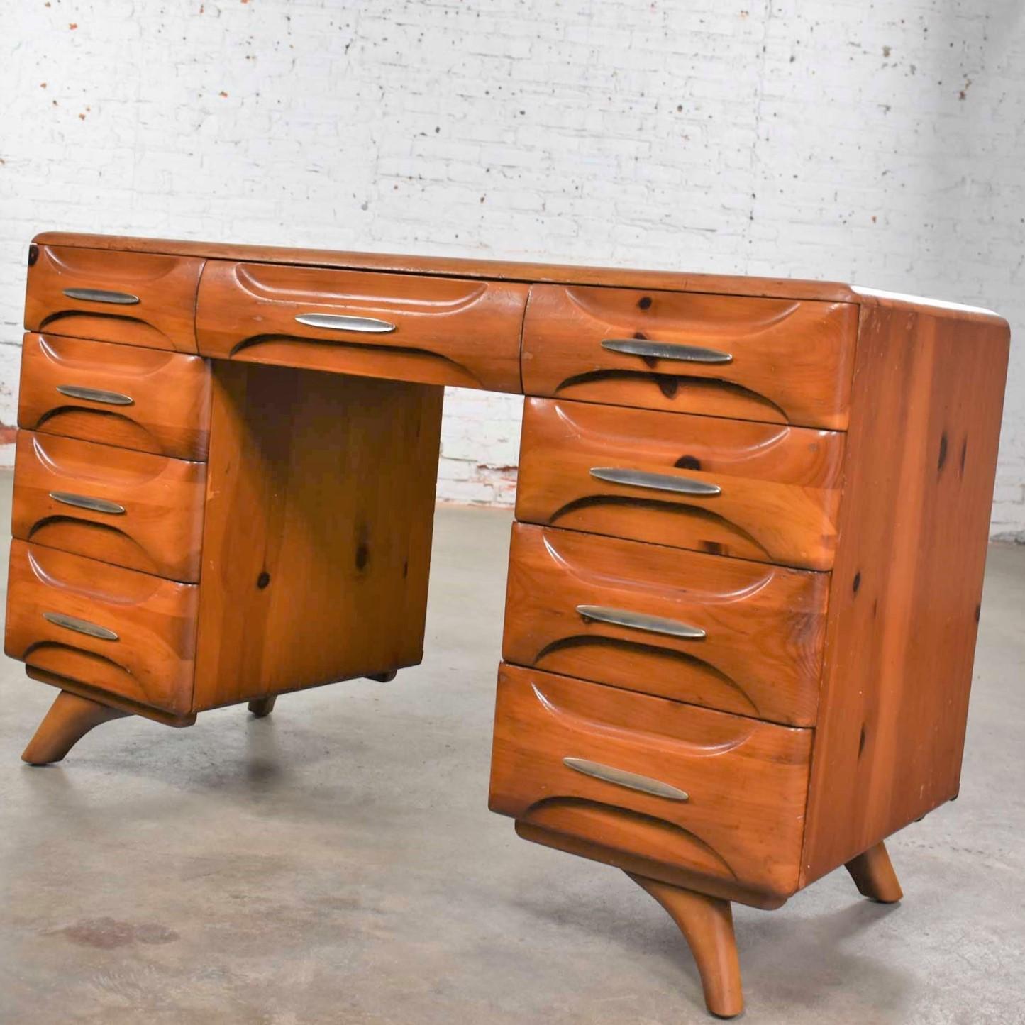 Handsome Mid-Century Modern double pedestal desk or vanity by Franklin Shockey Furniture from their Sculpted Pine Collection. In wonderful vintage condition. It does have some nicks and dings due to age and use but we have restored and touched up
