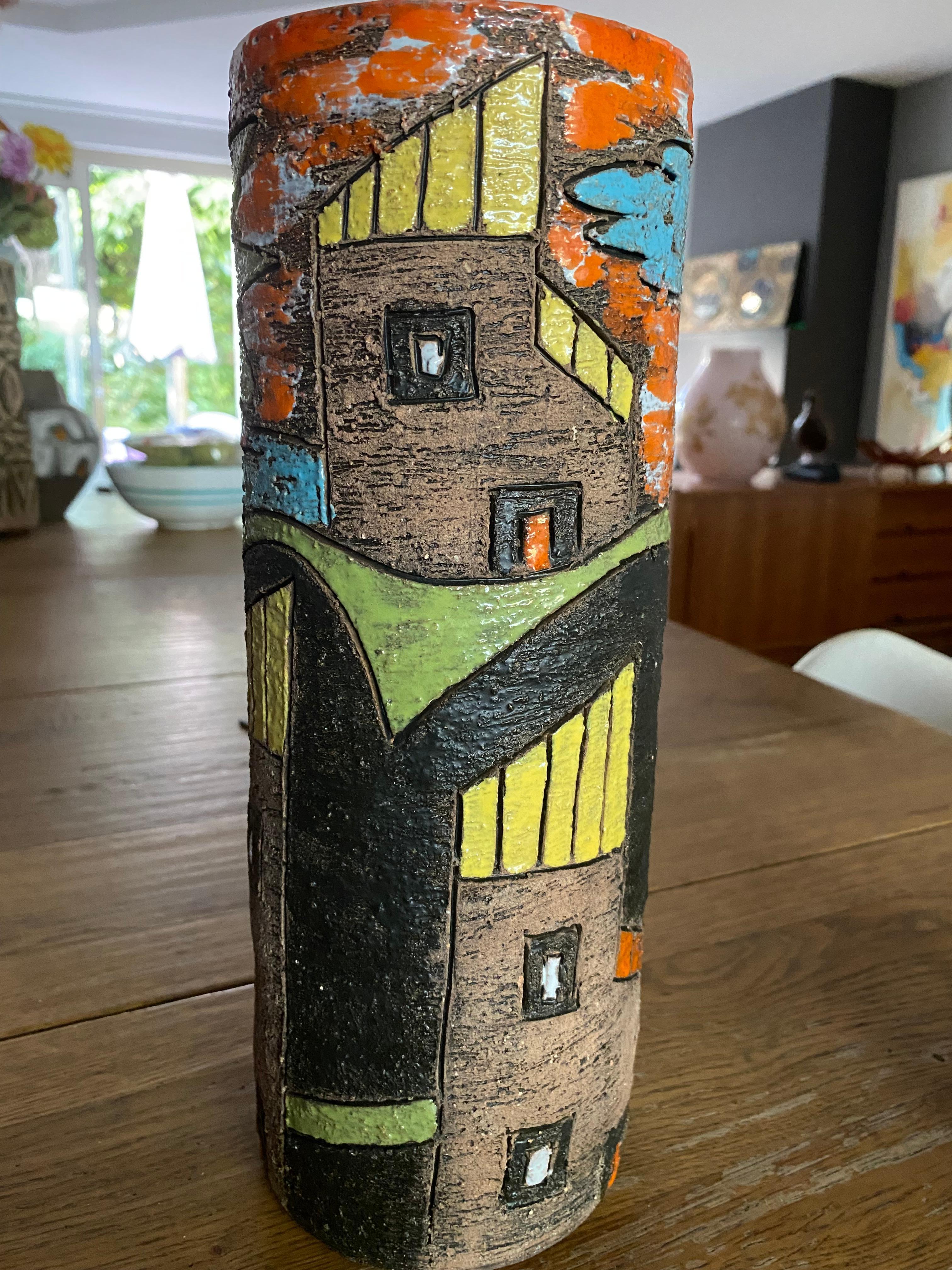 Stunning and vibrant, 30 cm high, vase with sgrafitto and hand-painted colored glossy pattern of houses. On the base is painted Italy and 4641.

Fratelli Fanciullacci Pottery: during the first half of the 20th century the firm slowly branched out