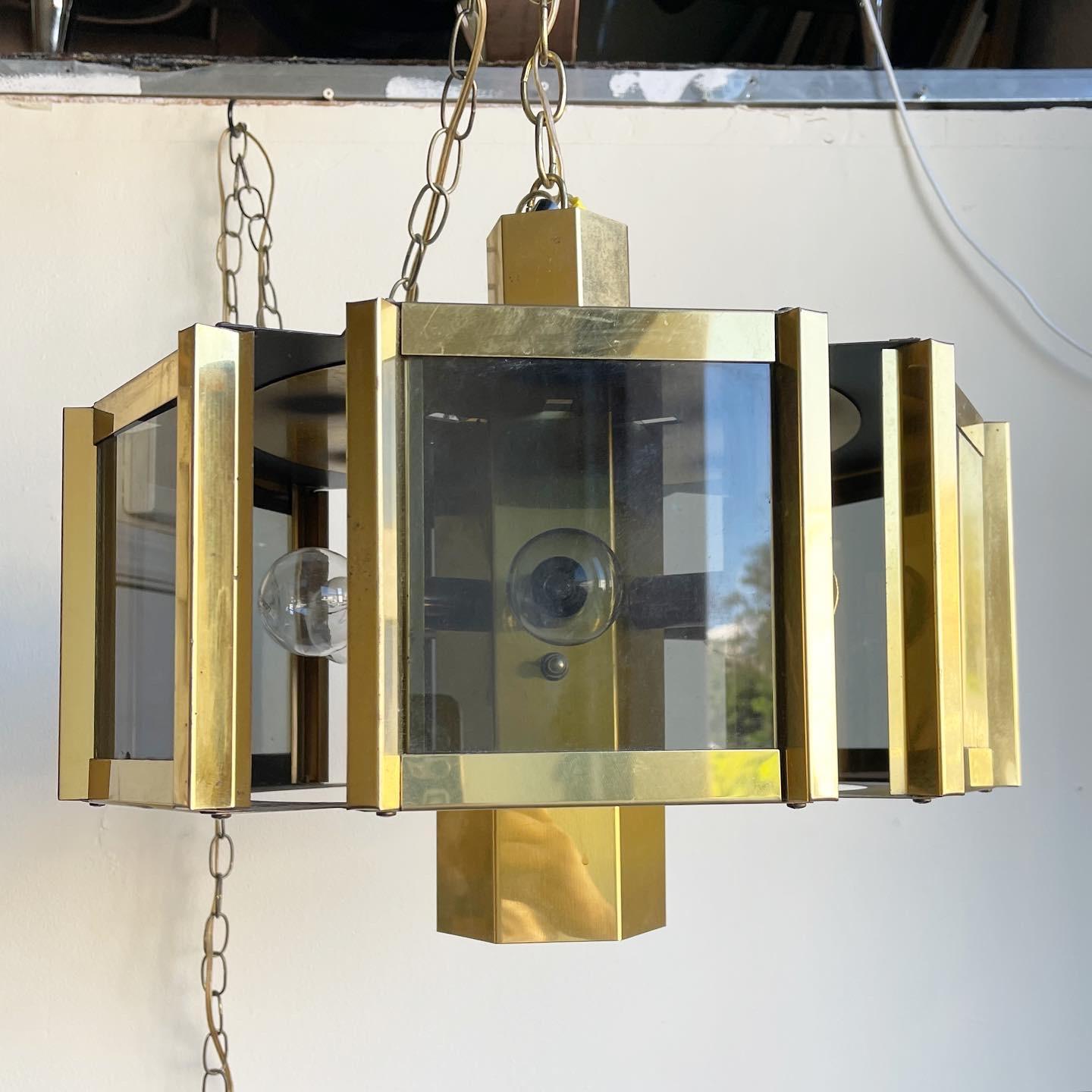 Incredible Vintage Mid Century modern swag lamp. Styled after Fredrick Ramond feature a Modern design of Brass and Smoked Glass. Plugs in, doesn’t need to be wired.