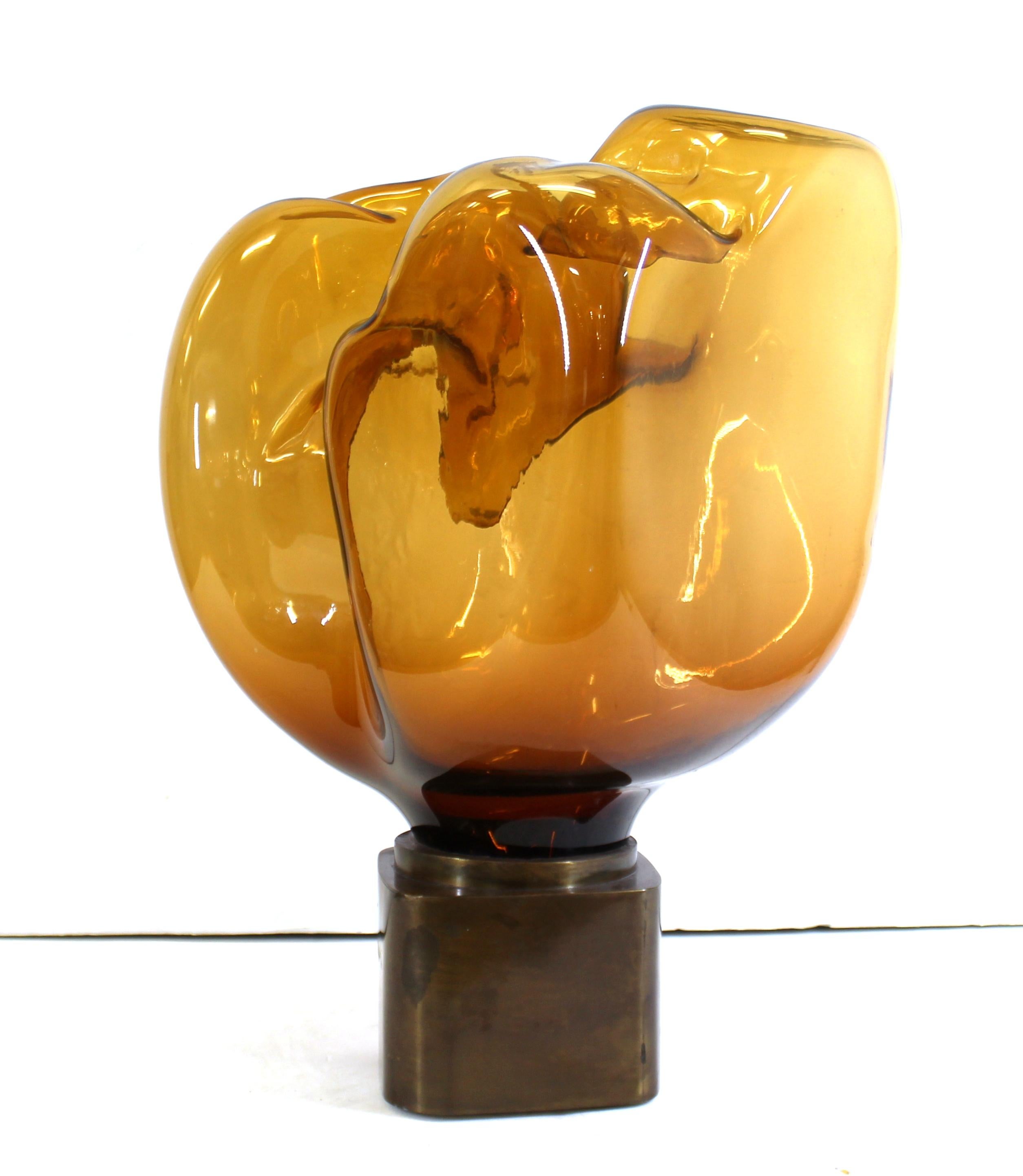 Mid-Century Modern freeform abstract hand blown amber art glass sculpture mounted on metal base, unsigned.