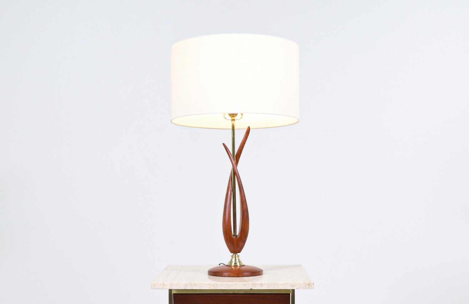 Dimensions:
32 in H x 7.50 in W x 7.50 in D

Lamp Shade:
10 in H x 17in W x 17in D.

______________________________________________________________

Transforming a piece of Mid-Century Modern furniture is like bringing history back to life, and we