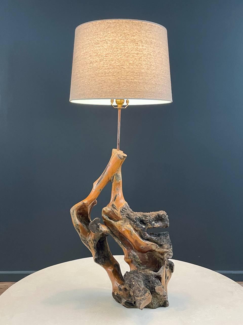Materials: Freeform Wood, New Lamp Shade

Condition
Newly Rewired, New Lamp Shade  

Dimensions: 
40.50”H x 15.50”W x 10”D
Shade:
10
