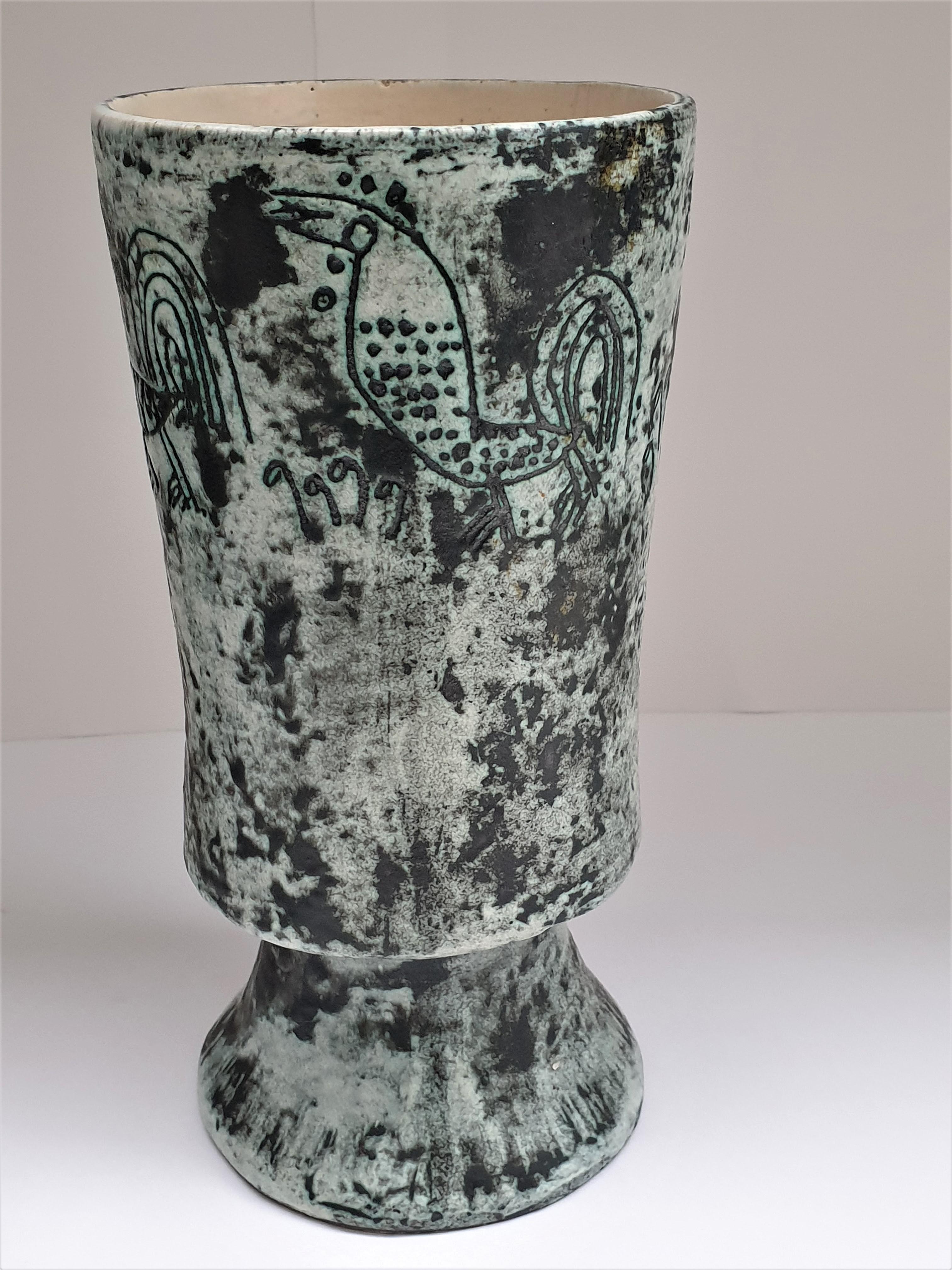 Simple matt glazed ceramic vase by Jacques Blin (1920-1995) depicting stylized birds.

Jacques Blin began making pottery in the late 1940s and his early work made use of modeling techniques, as well as slip casting and stamping, before moving on