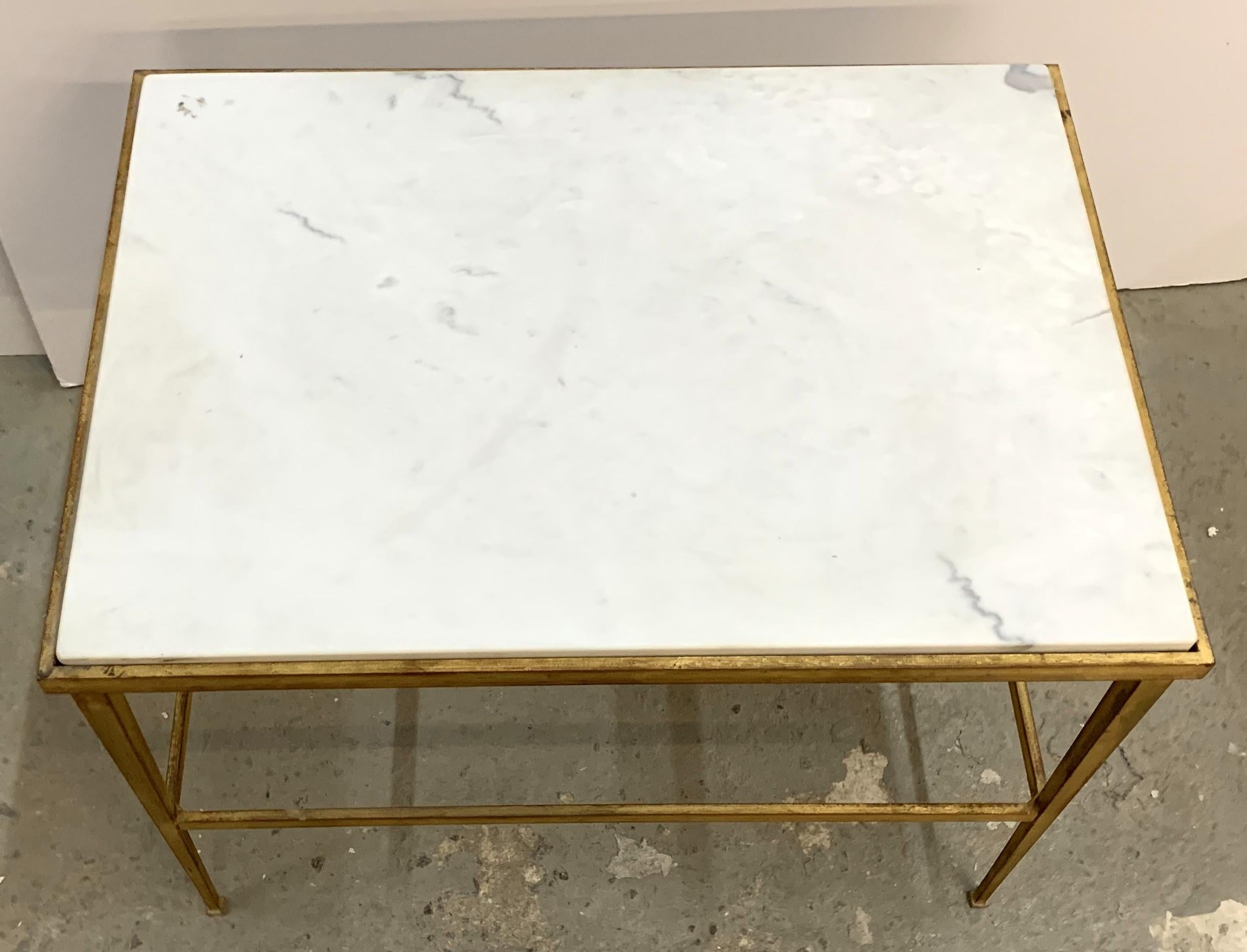 A wonderful Mid-Century Modern French gold gilt iron and marble-top cocktail, coffee or side table 
Purchased from Lorin Marsh.