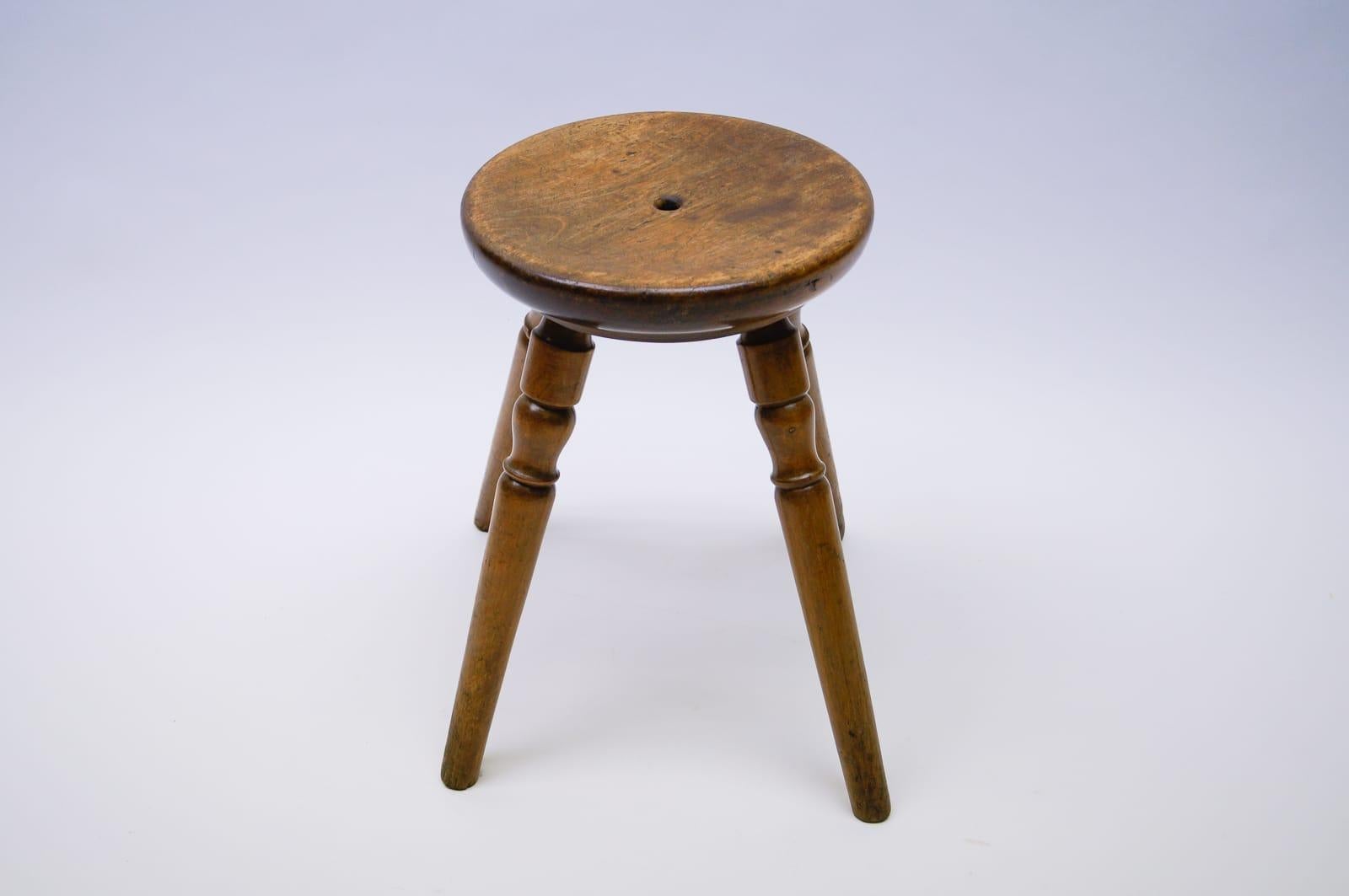4 legged wooden stool