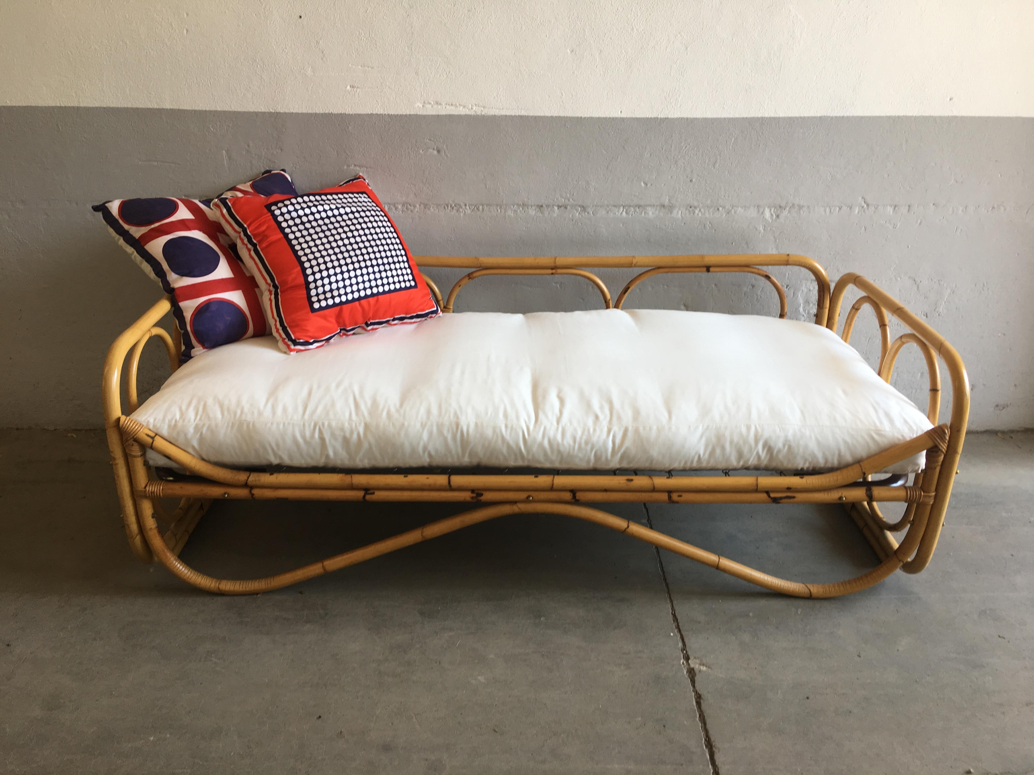 Mid-Century Modern French Riviera bamboo sofa,
This sofa needs a mattress or a cushion of cm. 80 x 190 (single bed size)
The sofa comes without cushions that are quotable on demand.
  