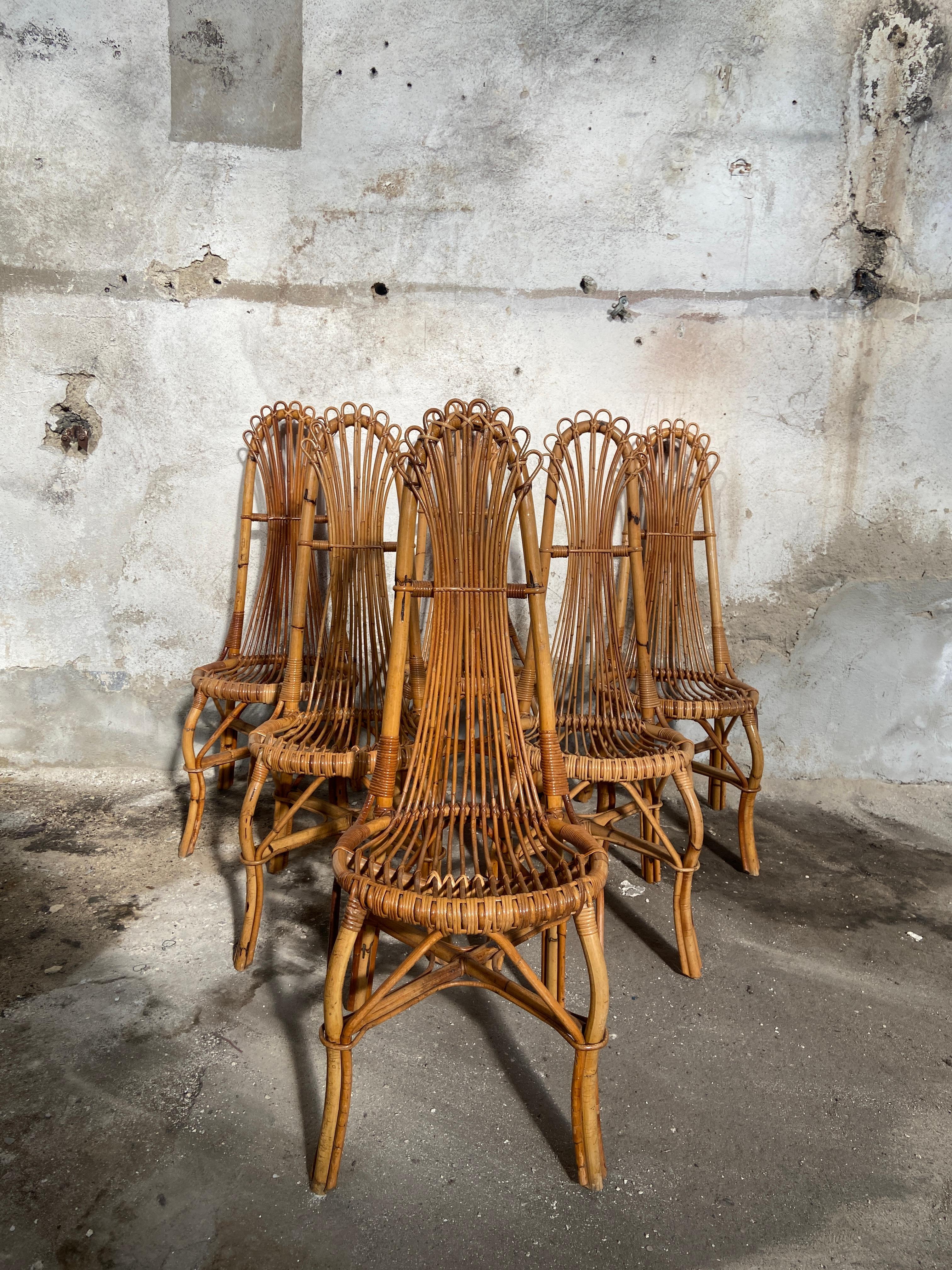 Mid-Century Modern French set of 6 bamboo and rattan high back dining chairs
This stunning set is in really good vintage conditions with a beautiful patina due to age and use.