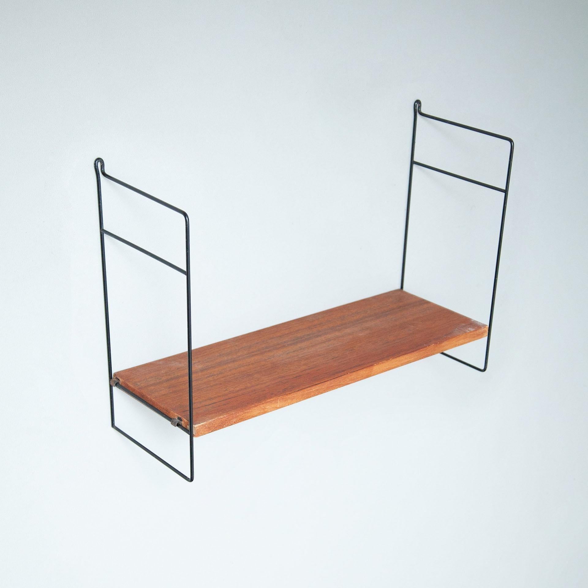 Mid-Century Modern French shelve.
By unknown manufacturer from France, circa 1950.

In original condition, with minor wear consistent with age and use, preserving a beautiful patina.

Material:
Wood
Metal.
  