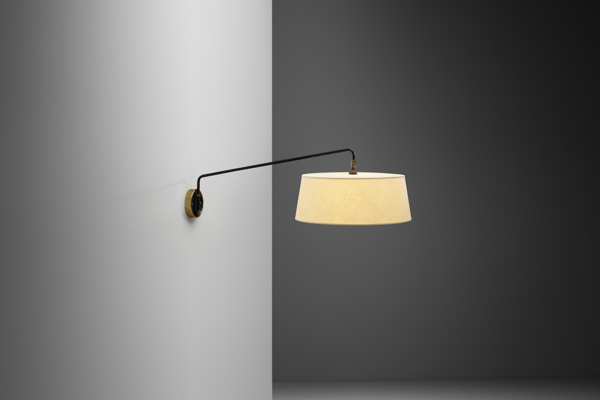 French mid-century designs were notable for their revolutionary approach to material, drawing upon industrial technology without compromising on aesthetic. Classic pieces - like this wall light - include works in lightweight, folded sheet metal