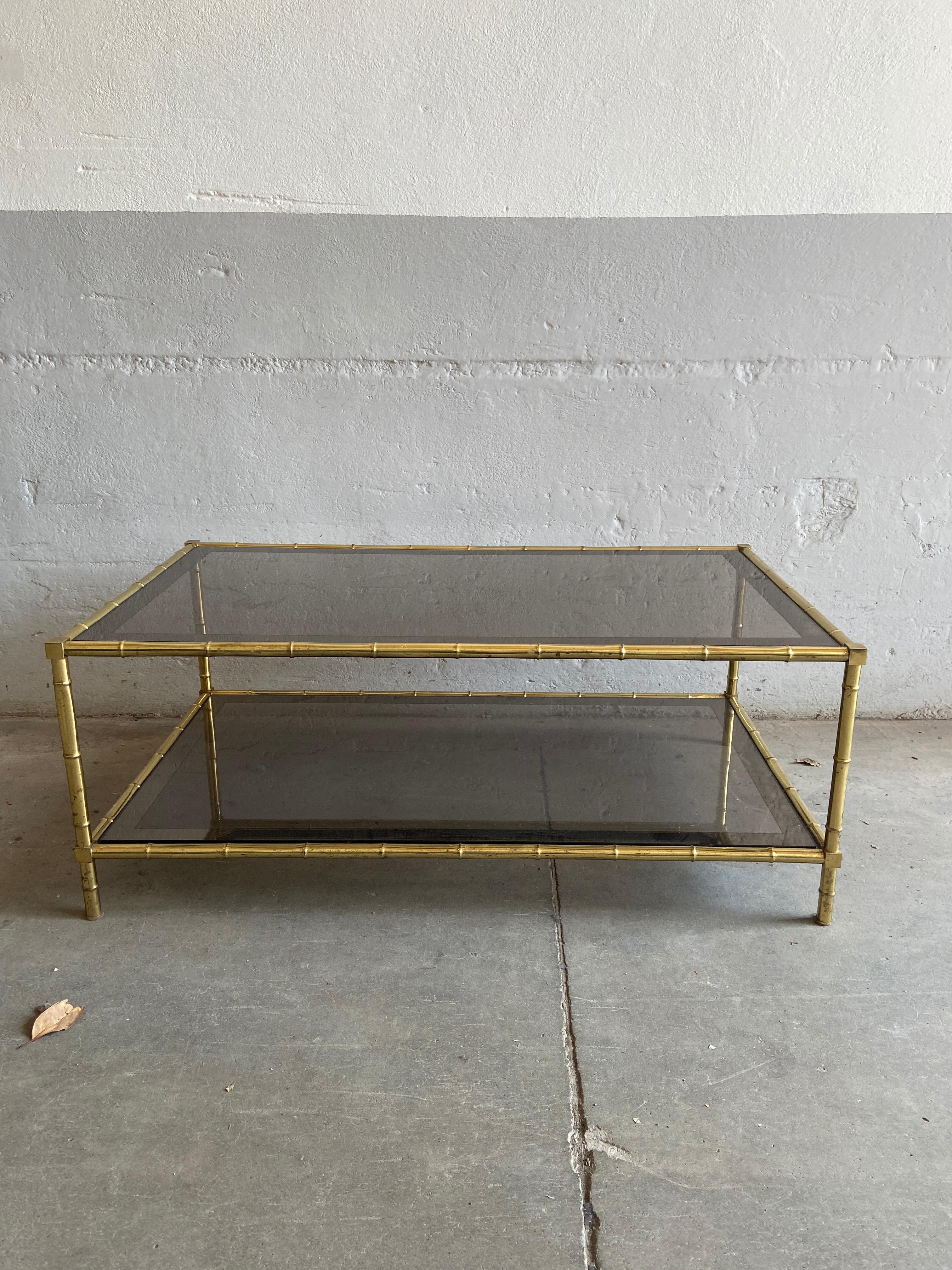 Mid-Century Modern French two-tier coffee or sofa table in faux bamboo brass with mirrored edges smoked glasses by Maison Baguès from 1960s.