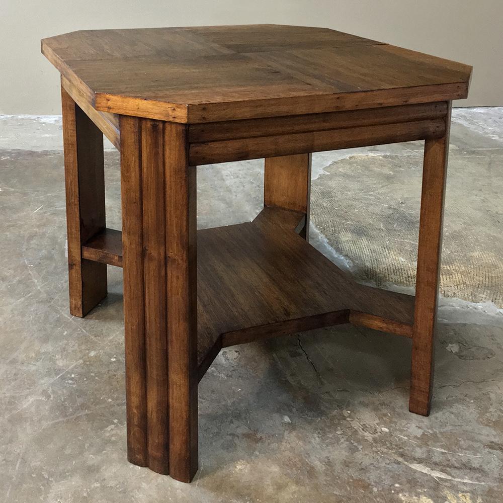Mid-Century Modern French walnut end table exudes the sheer natural beauty of Europe's finest furniture wood, and features mitered corners for a more user-friendly surface for your favorite seating group! Shelf below the top provides stylish support
