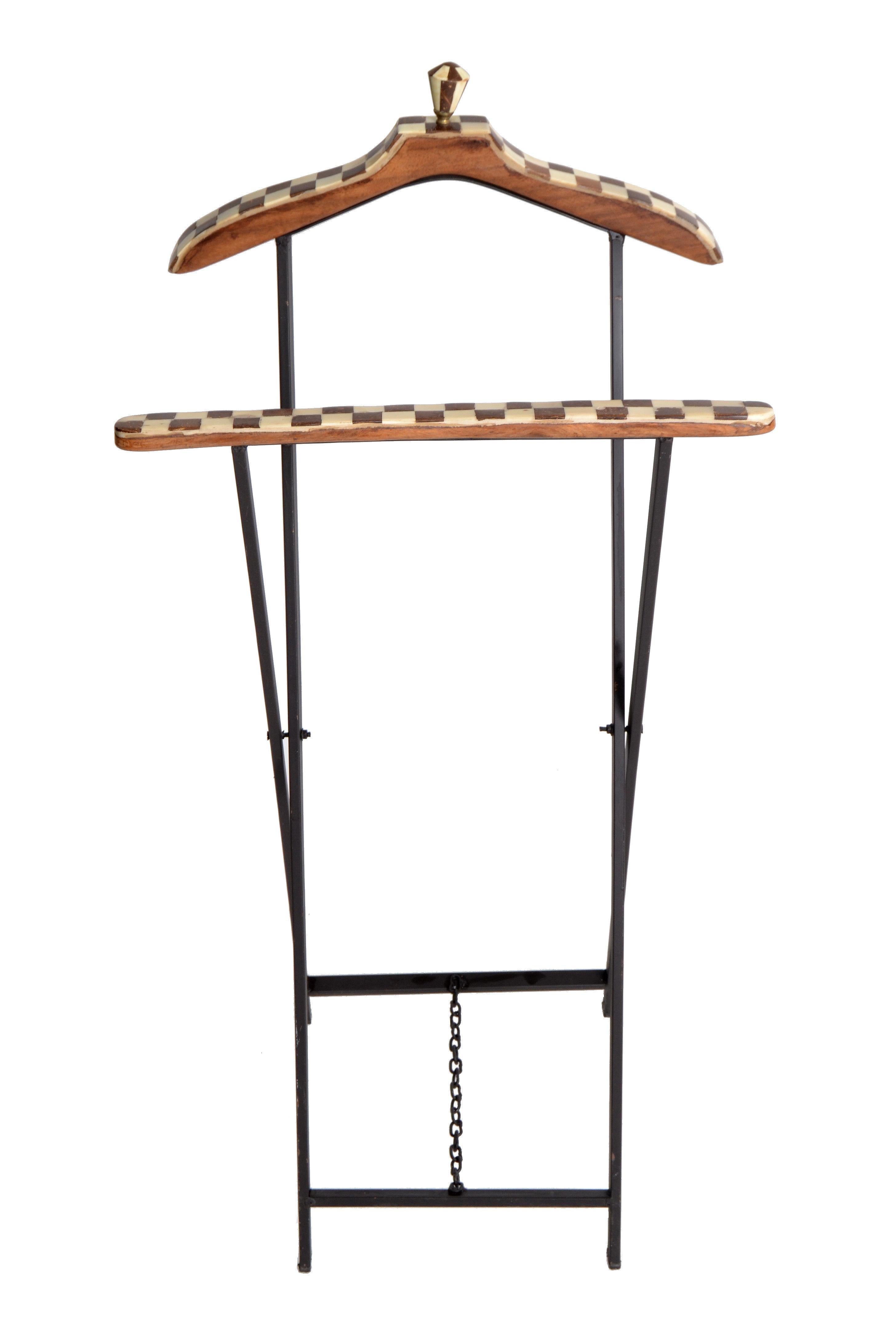 Mid-Century Modern French men's valet stand/coat stand handmade out of wood Marquetry, metal and brass hardware.
It is fully collapse-able.
Dimensions folded: 20.0 W × 4.0 D × 42.0 inches H.
 
  