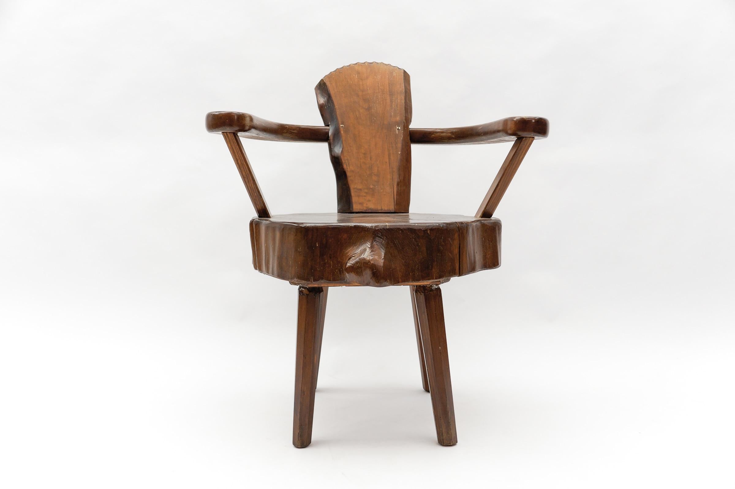 A total of four are available and are offered for sale here on the platform. 

Dark stained. Cool optic. Handmade imposing wooden armchair. Each armchair is unique.

This armchair here has a seat height of 46cm. The tree trunk thickness is 11cm.

 

