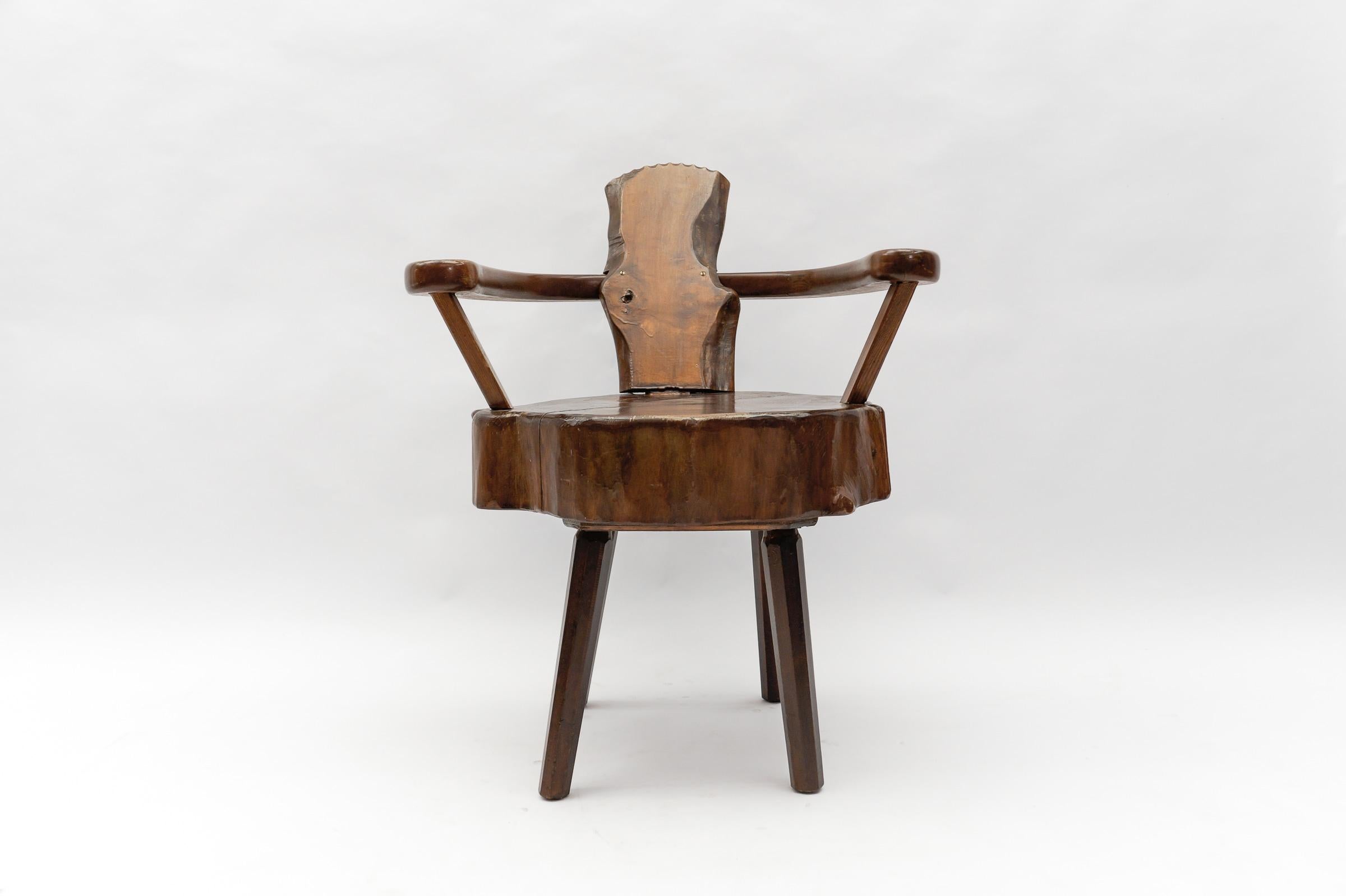A total of four are available and are offered for sale here on the platform. 

Dark stained. Cool optic. Handmade imposing wooden armchair. Each armchair is unique.

This armchair here has a seat height of 50cm. The tree trunk thickness is 11cm.

 
