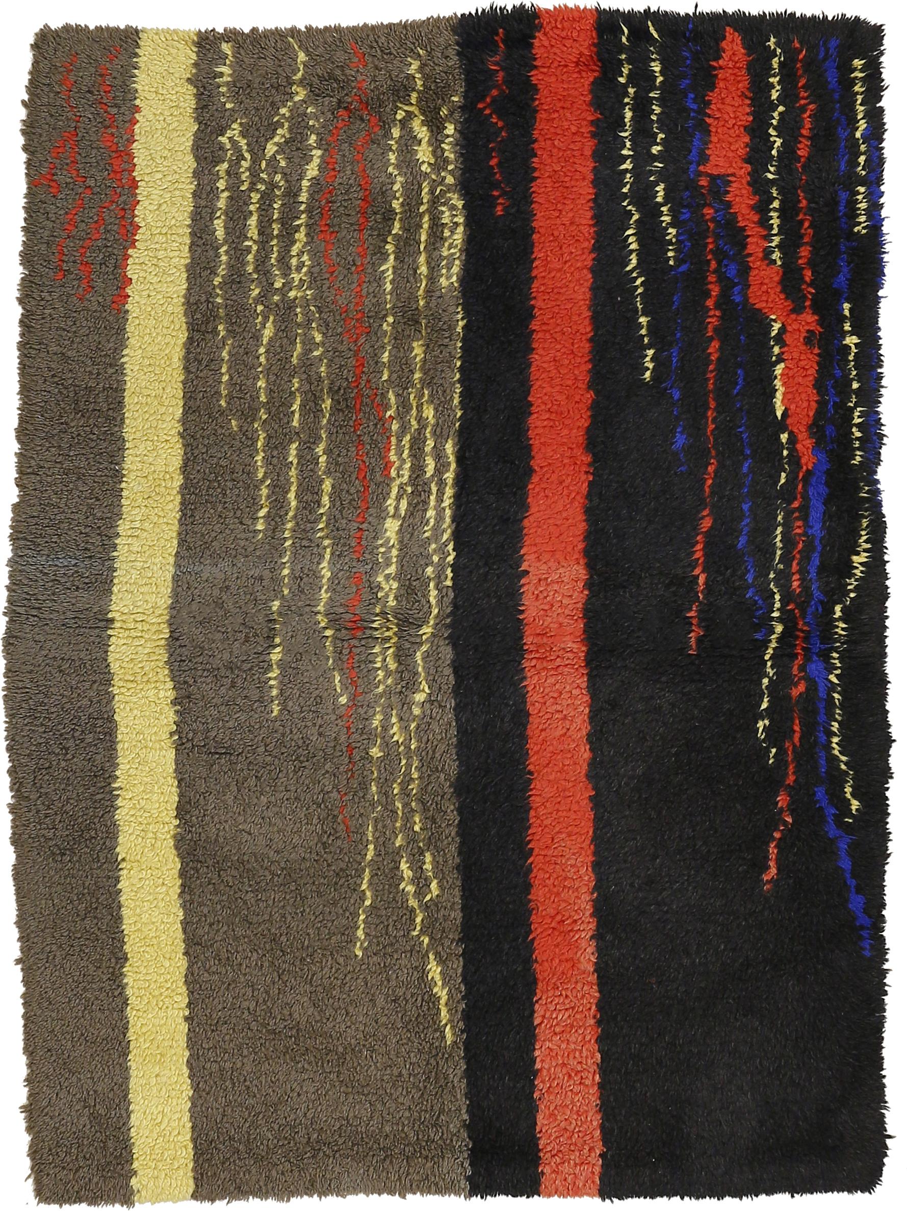 Influenced by the abstract patterns of Berber weavings from the Middle Atlas called 'Boujad', which were avidly collected by many French artists during the colonial period, this rug displays the experimental nature of French carpets after World War