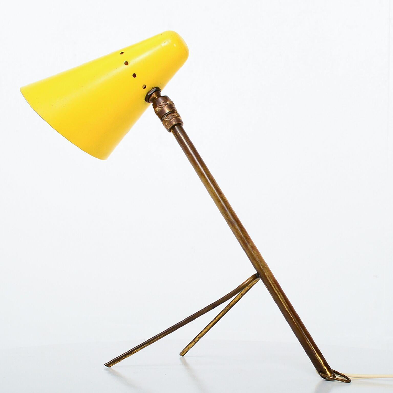 For your consideration a vintage French table or wall lamp. Attributed to designer Jacques Biny. The table has a tripod base that can be placed on a tabletop, or a hook that allows is to attach to a wall with a bracket (not included), circa 1950s.