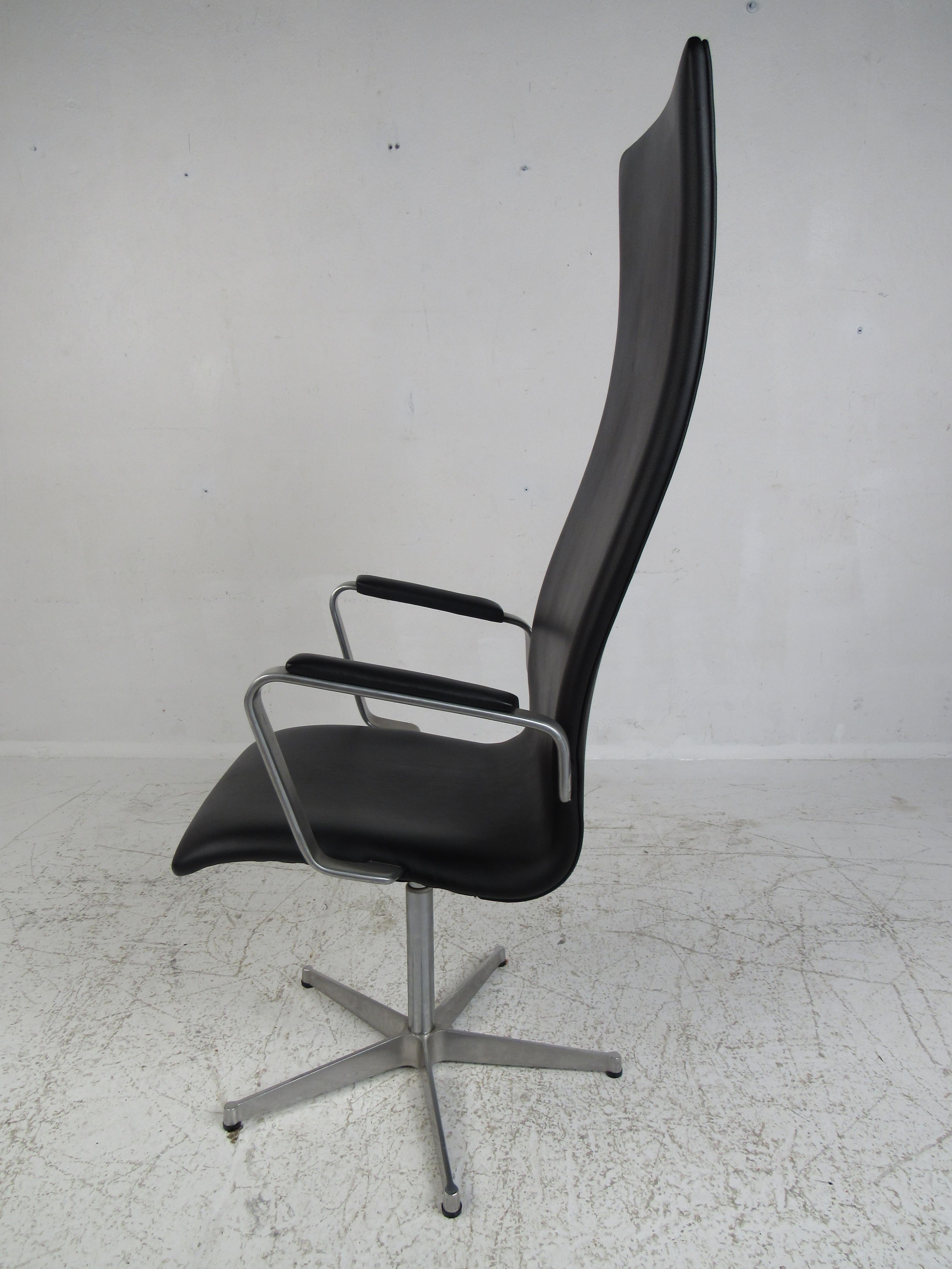 This stunning vintage modern desk chair boasts a tag underneath with the date 1980 and designer name, 