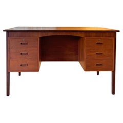 Mid century modern front facing desk made of teak, circa 1960s