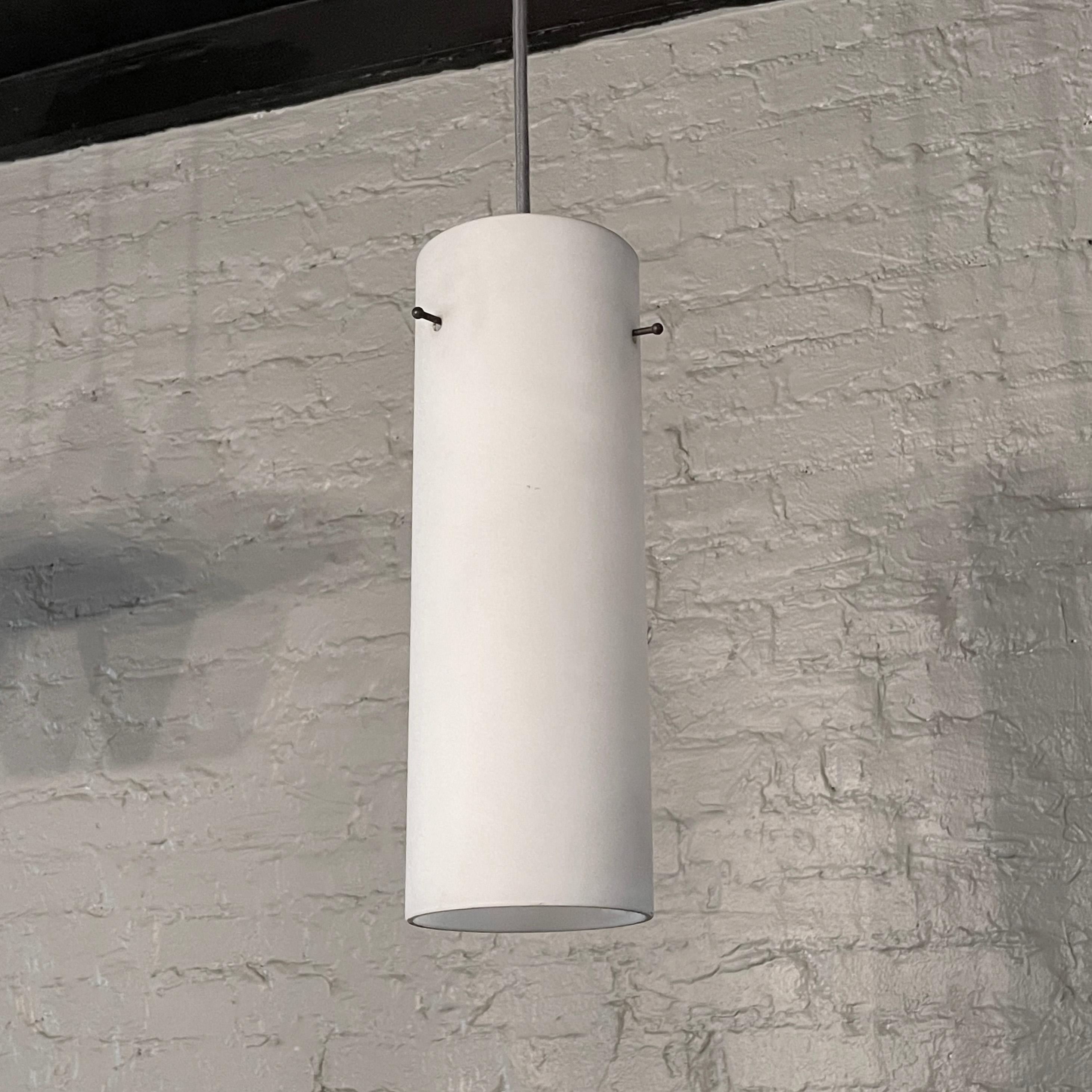 Minimal, Mid-Century Modern, frosted glass cylinder pendant is newly wired with 36
