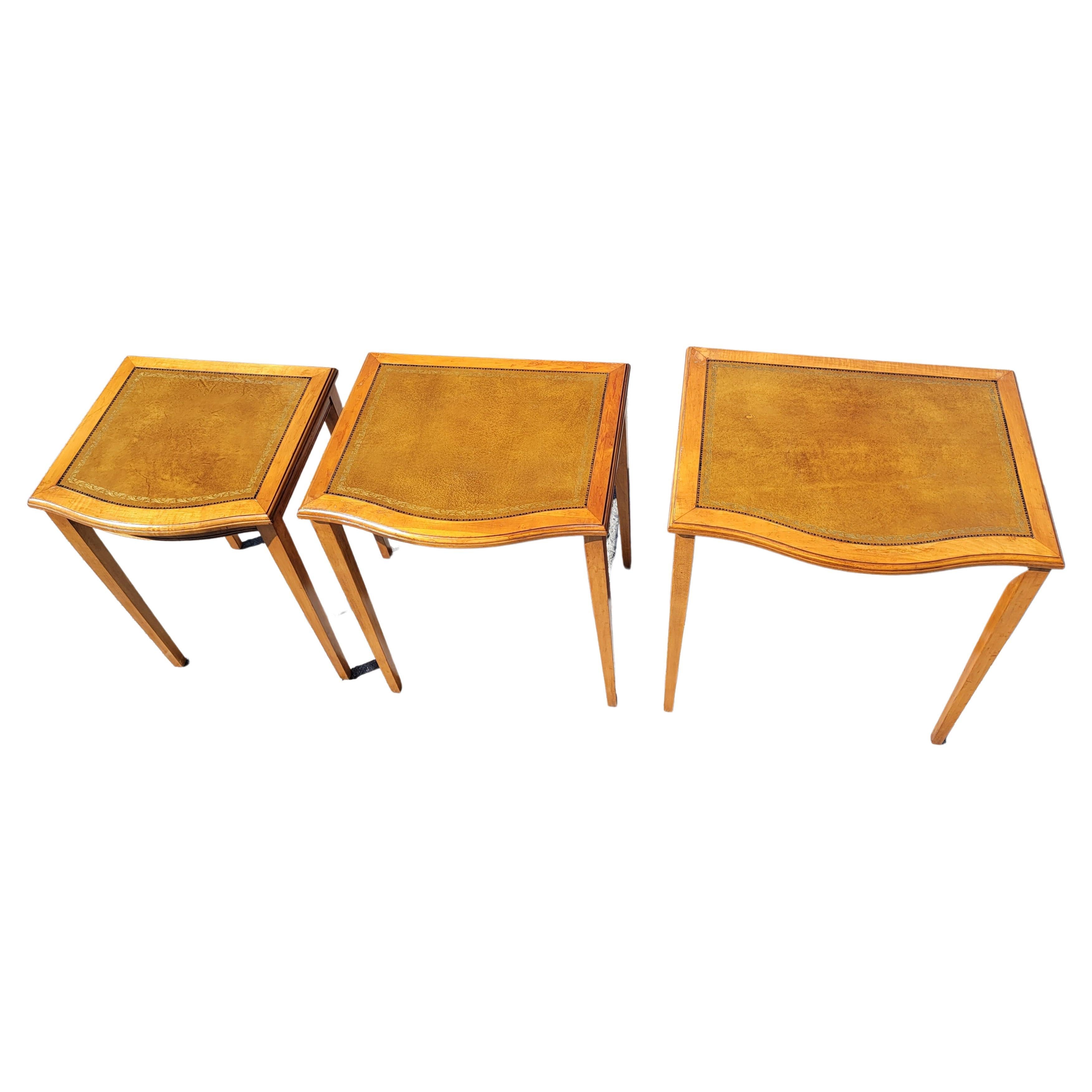 20th Century Mid-Century Modern Fruitwood Stenciled Leather Top Nesting Tables, Set of 3 For Sale