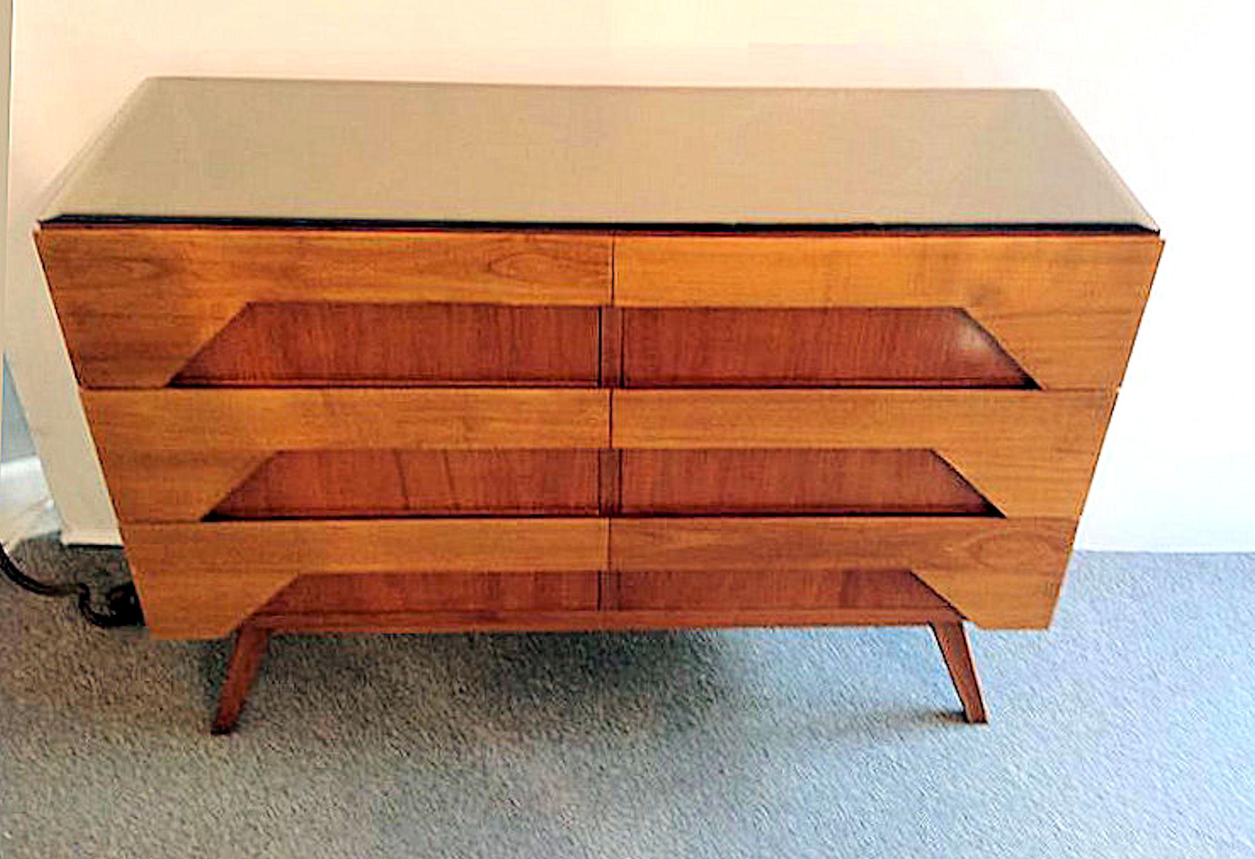 Clear and dark fruit wood Italian Mid-Century Modern chest of drawer or dresser.
Topped with a bronze colored mirror, 
The vintage Italian dresser has 6 large drawers. 
From Milano, Italy, circa 1960.
In very good condition.