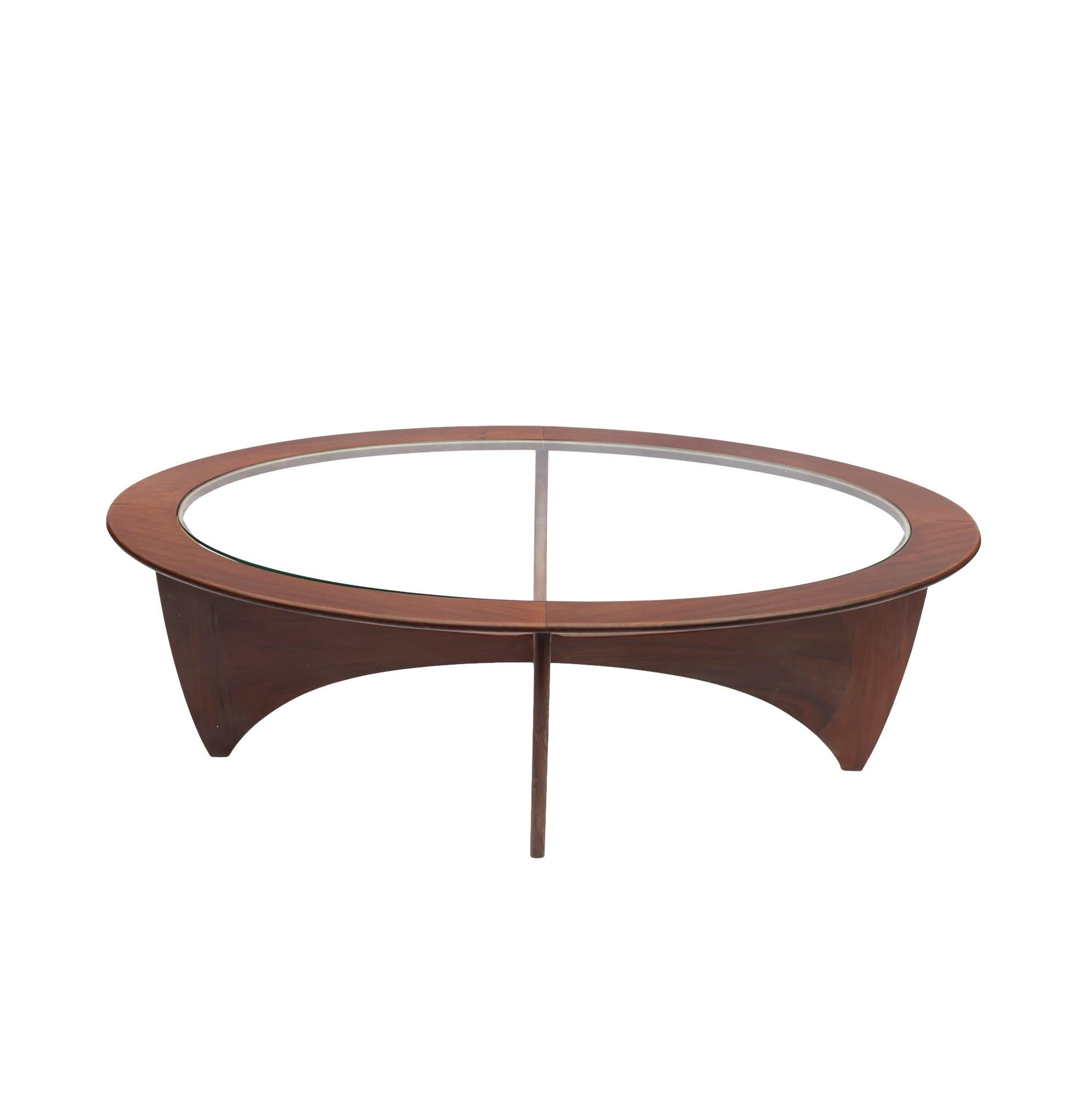 G Plan 'Astro' coffee table. Measure: W-48 ins.
This iconic table, designed by Victor Wilkins for G Plan in 1960, is an emblem of the time, the world’s entry into the Space Age. 
Constructed in Afromasia teak; with glass insert. 
When the years