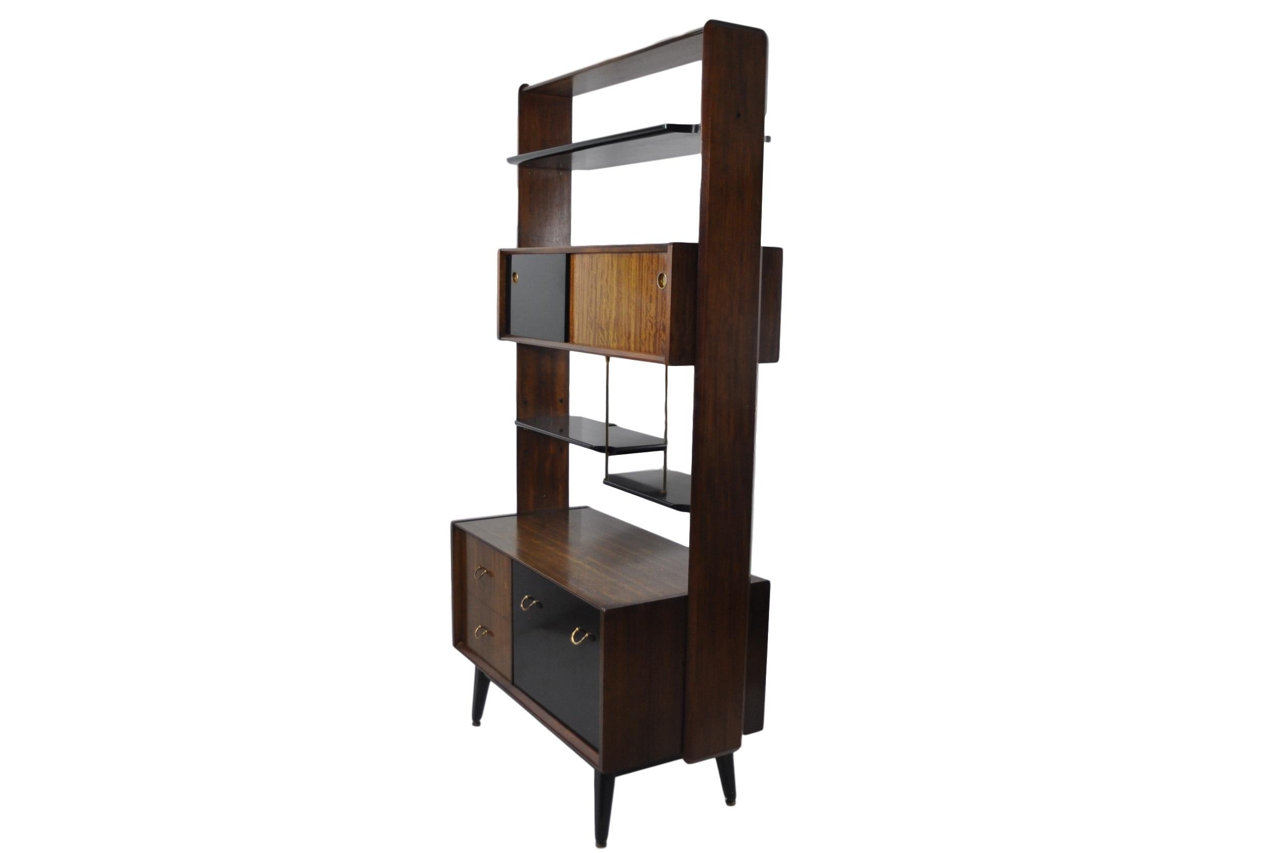 Mid-Century Modern G-plan room Divider shelving unit with sliding top cabinets and fall front secretaire on bottom and ebonized wood shelves. Stamped G-Plan, designed by LB Kofod-Larsen for G-Plan.
 