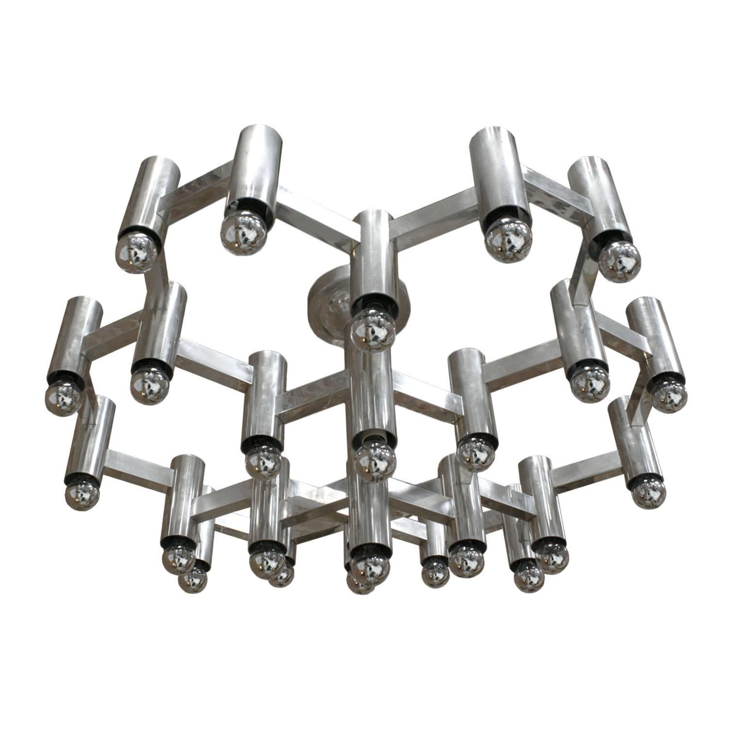 Italian pendant lamp designed by Gaetano Sciolari in 1970s. Structure made of steel. Composed of 24 points of light.

Gaetano Sciolari was an Italian designer known for his Mid-Century Modern lighting fixtures. Born around the turn of the 20th
