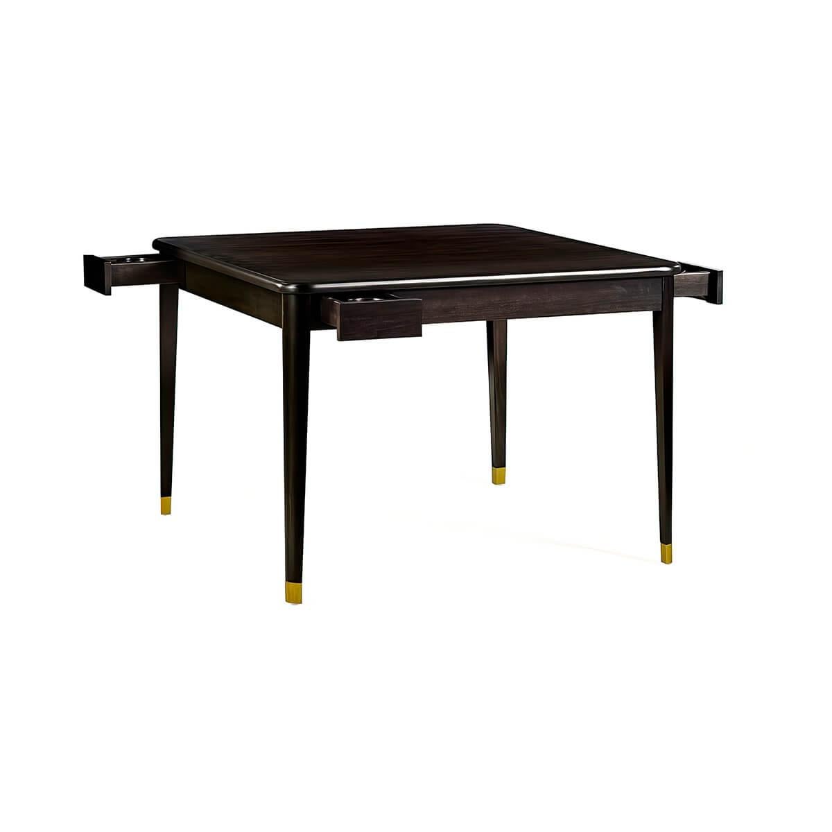Characterized by its clean, straight lines and minimalist aesthetic, the square table has a warm hand-rubbed dark stain finish. The design features a square top with rounded edges and corners, and tapered legs with brass caps, contributing to a