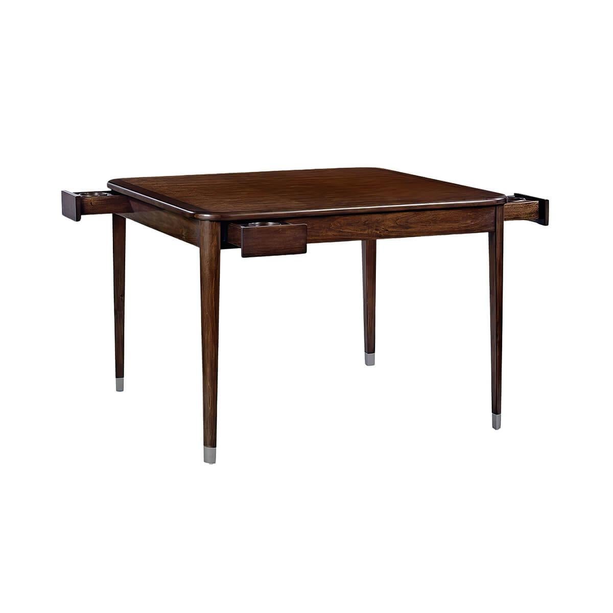 Characterized by its clean, straight lines and minimalist aesthetic, the square table has a warm hand-rubbed walnut stain finish. The design features a square top with rounded edges and corners, and tapered legs with brass caps, contributing to a