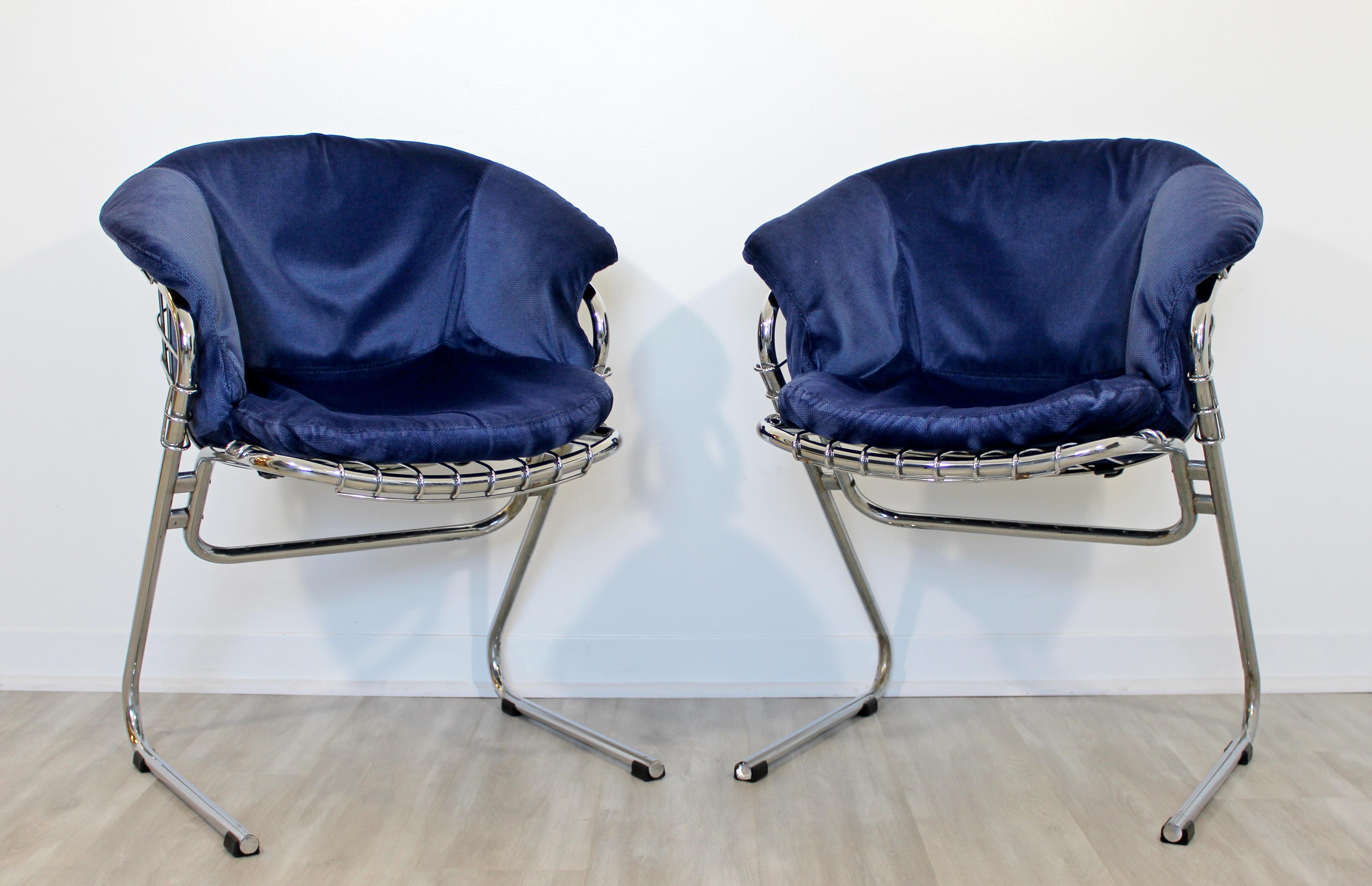 For your consideration is a marvellous pair of cantilevered chrome side lounge armchairs, by Gastone Rinaldi, circa the 1970s. In excellent vintage condition. The dimensions are 25