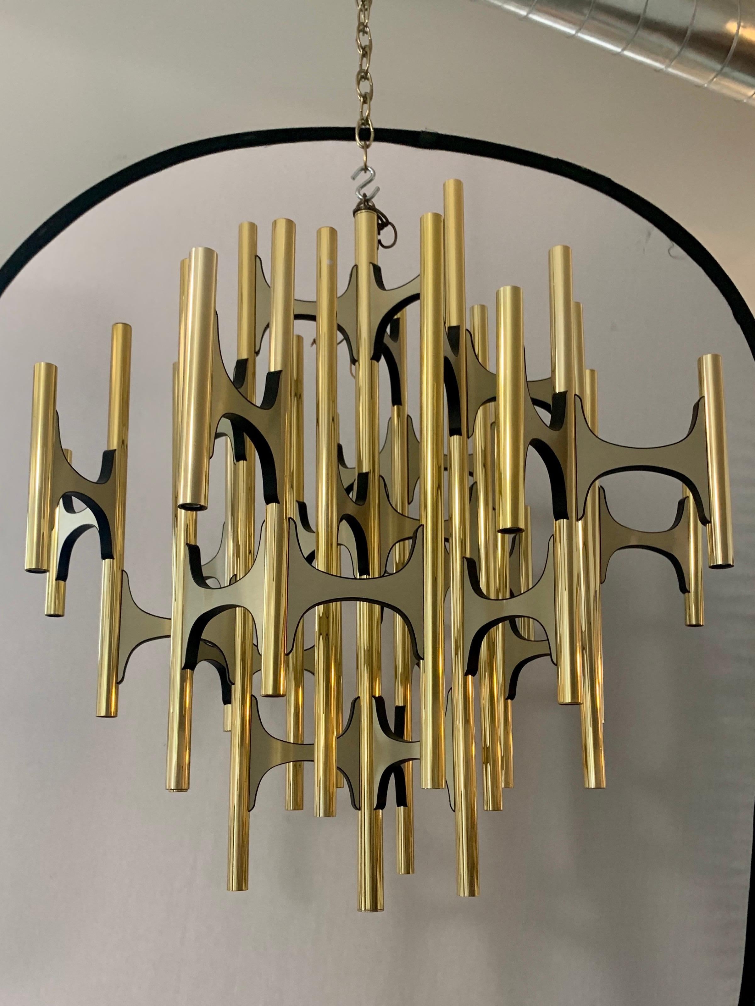 Rare brass, versus chrome, Gaetano Sciolari fifty two light chandelier. All gold and stunning.
As Sciolari chandeliers go, this is a large one. Wired for USA and in perfect working order.
Perfect for that special room in your upscale abode. Forty