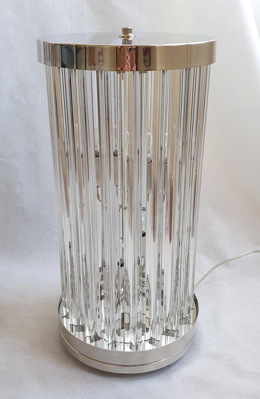 Pair of large vintage Murano glass and nickel plated lamps, by Venini, Italy, 1980s.
The Mid-Century Modern lamps are made of clear 