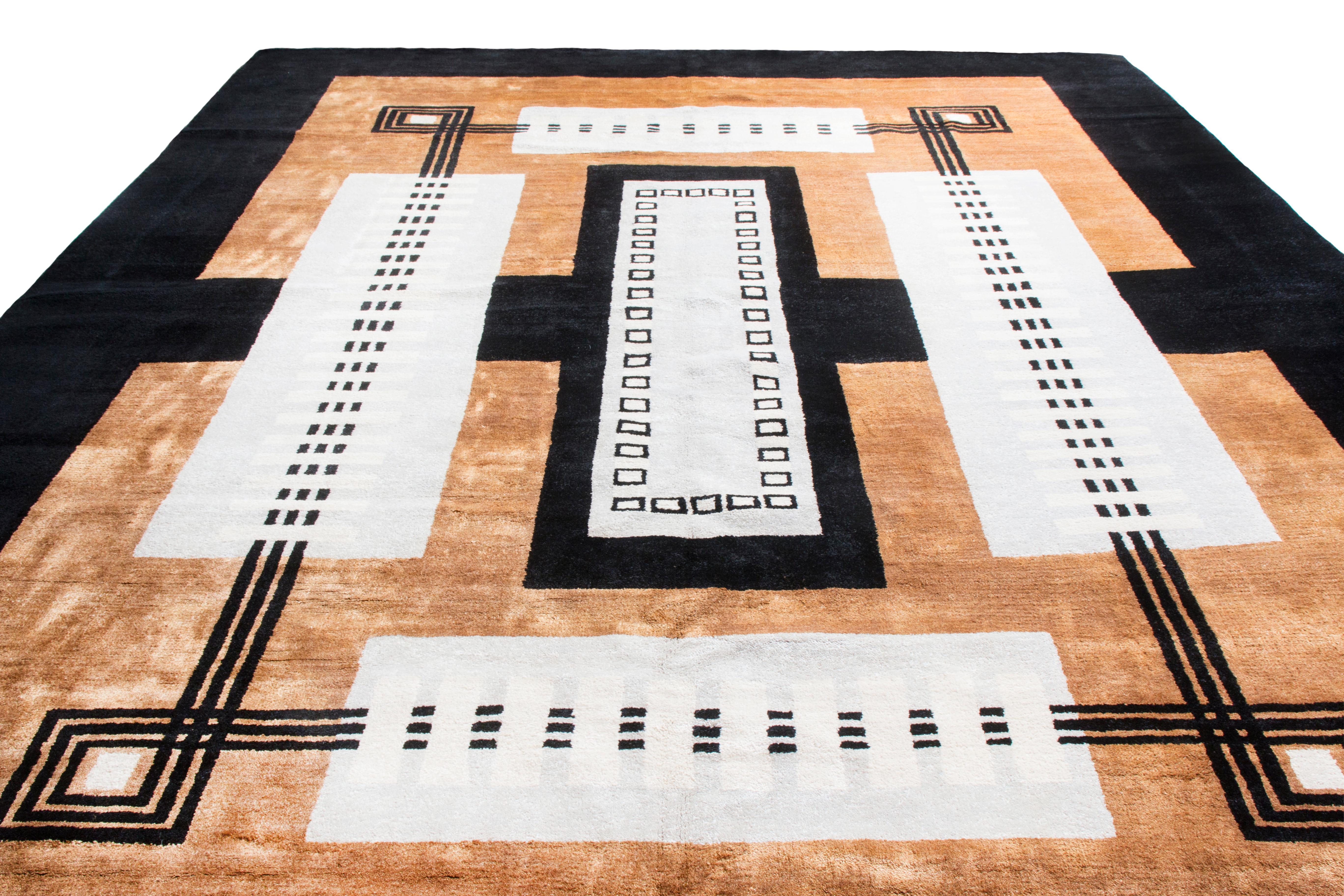 This architectural geometric rug from Rug & Kilim is one of its Mid-Century Modern collection, marrying several influential styles. Originating in India, the geometric field combines elements of architectural and Art Deco designs in vertical and