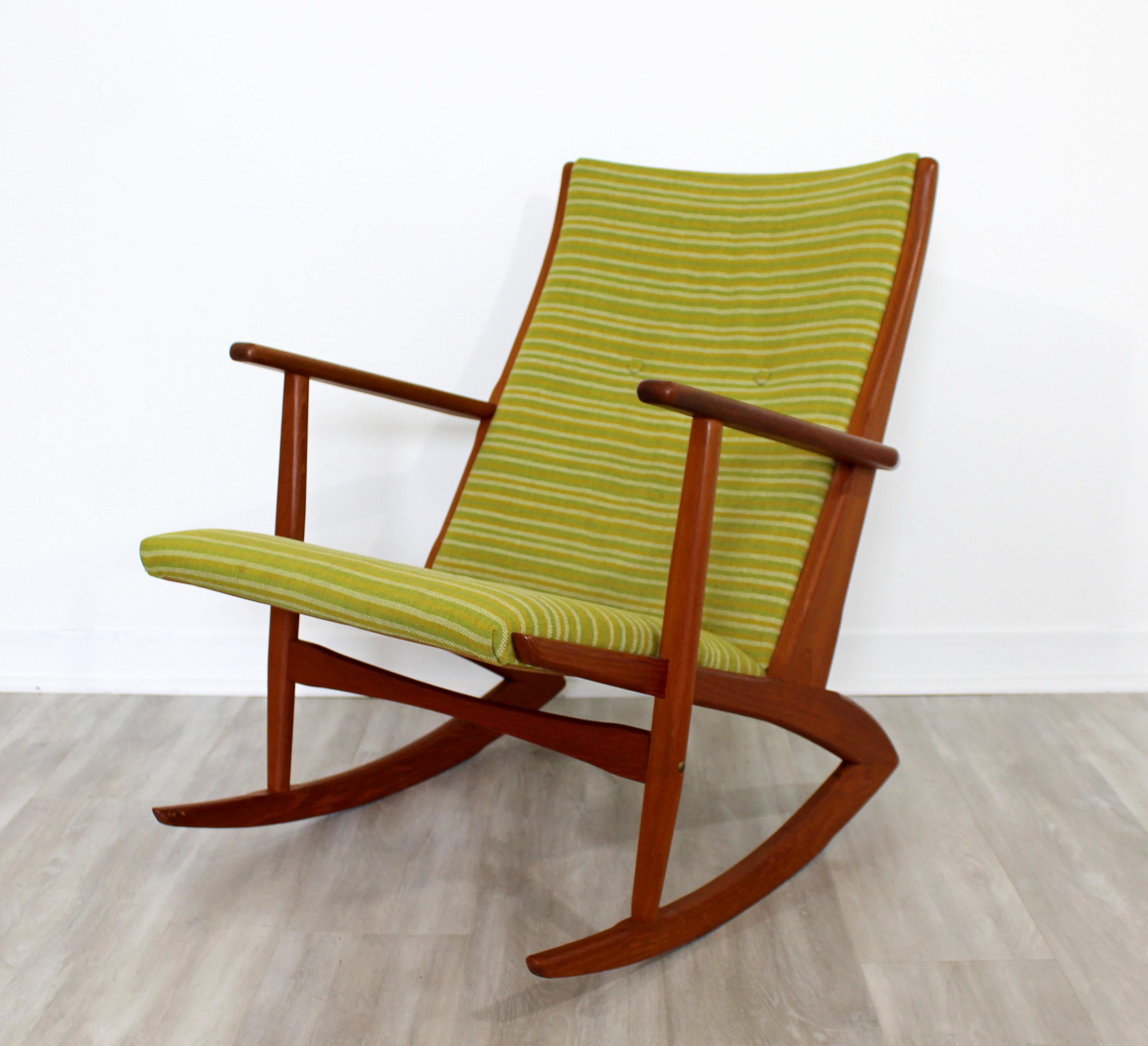 For your consideration is a gorgeous, angled rocking armchair, by Georg Jensen, circa 1950s. In excellent vintage condition. The dimensions are 21