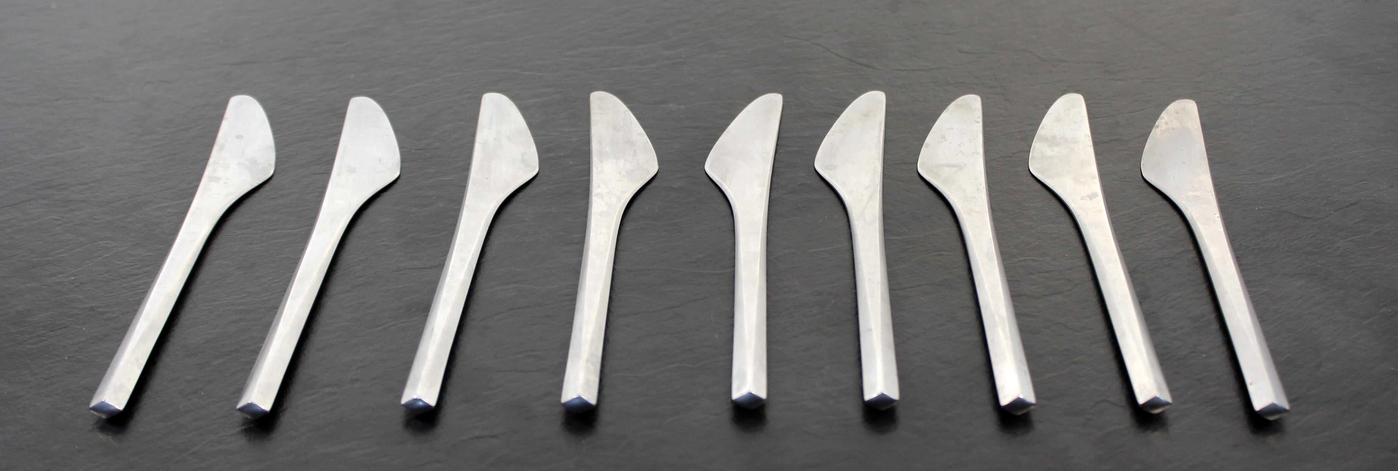 For your consideration is a set of nine, matte stainless steel dinner knives from the Prism cutlery series, by Georg Jensen, circa the 1960s. All pieces stamped 