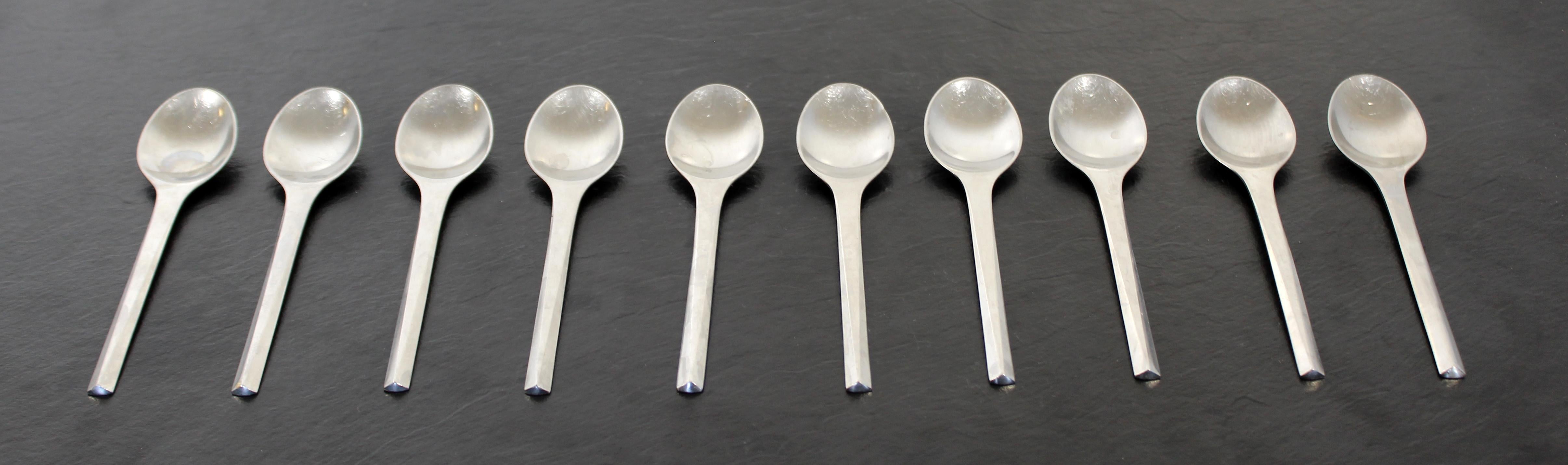 For your consideration is a set of ten, matte stainless steel dessert spoons from the Prism cutlery series, by Georg Jensen, circa the 1960s. All pieces stamped 