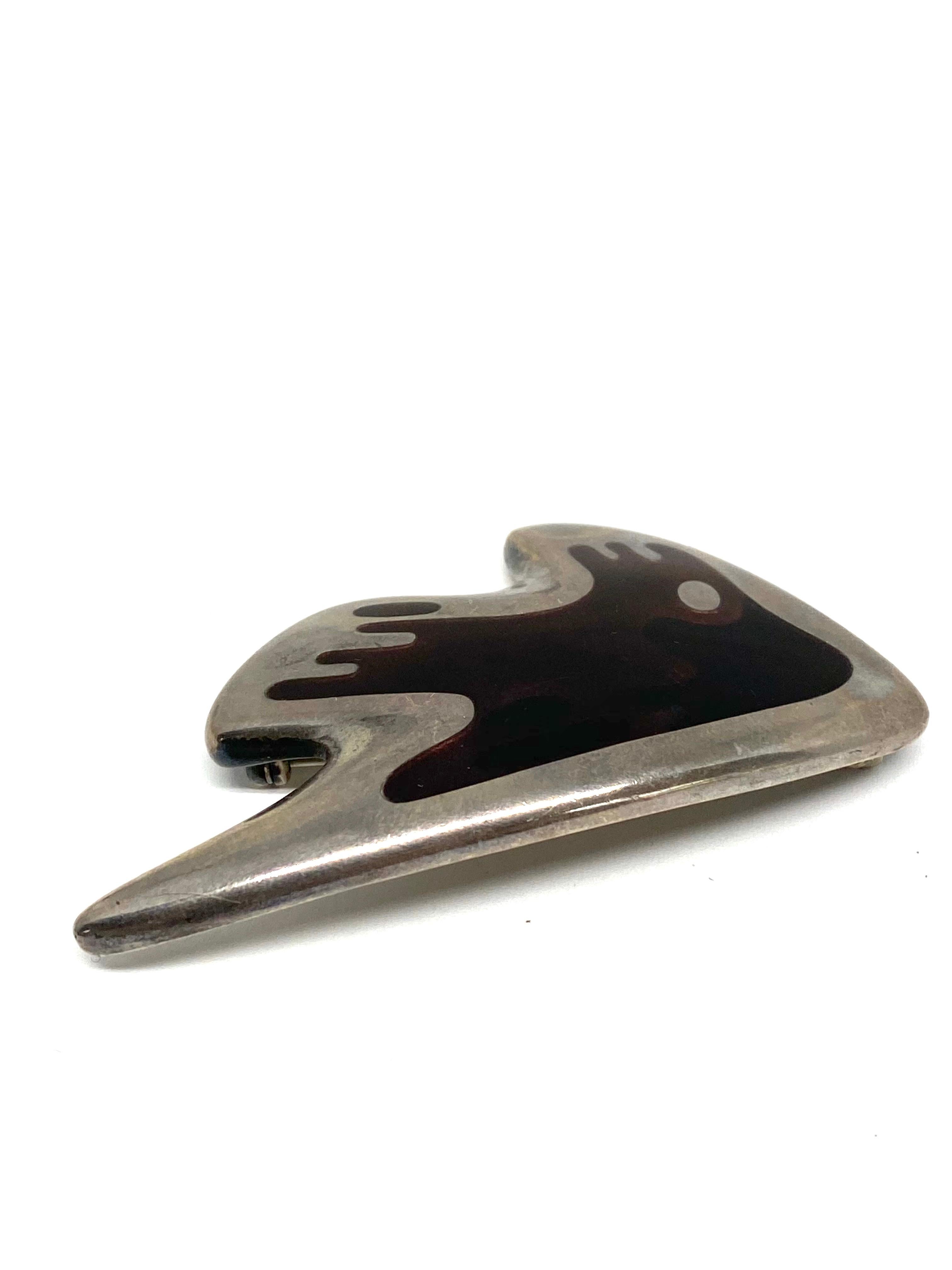 Mid- Century Modern Georg Jensen Sterling Silver & Enamel Abstract Brooch #307

Product details:
Circa 1947
Sterling silver and two- tone enamel detailed design 
Designed by Henning Koppel
Inspired by the sea 
Signed Georg Jensen HK, stamped