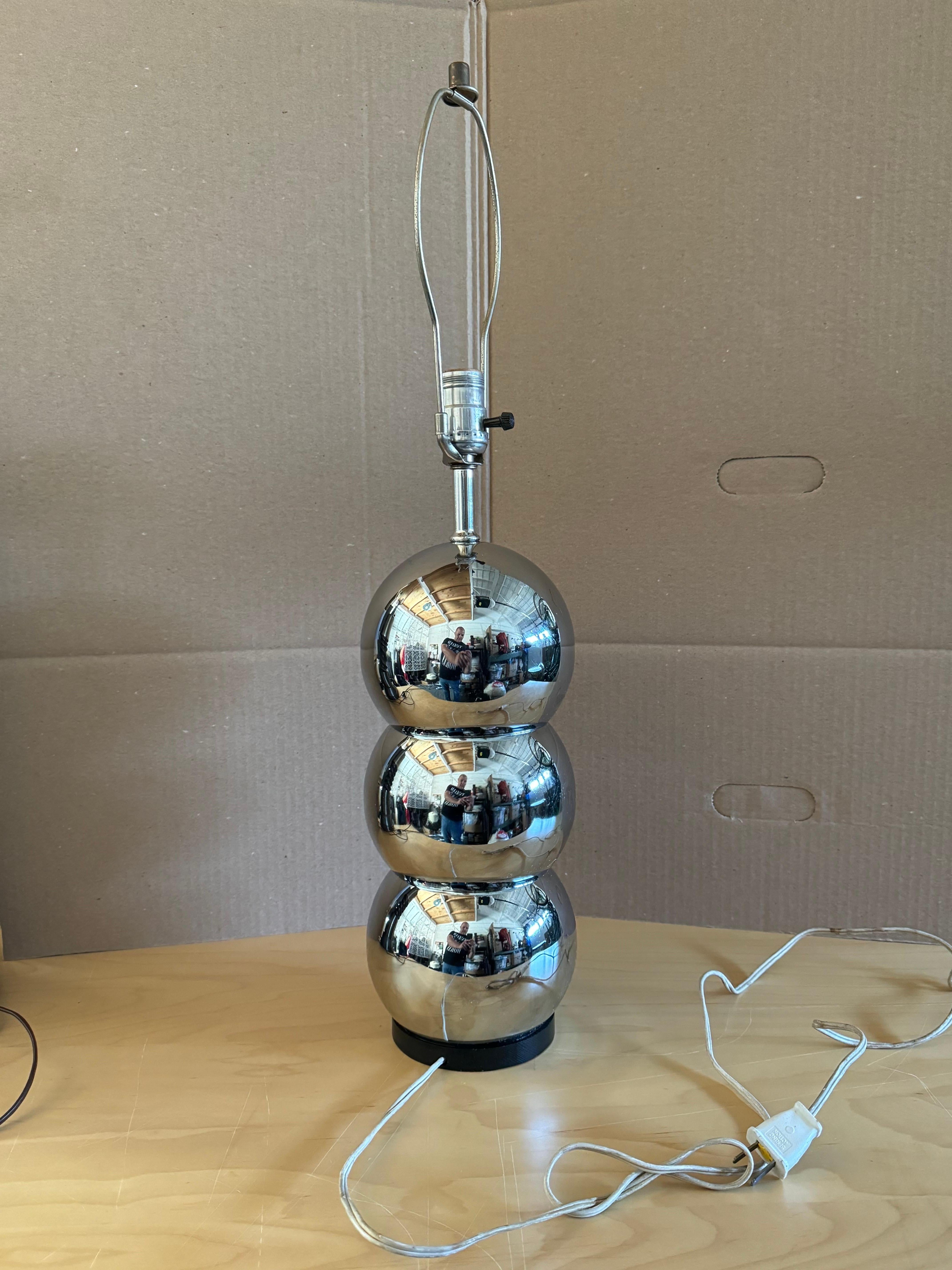 For Sale: Mid-Century Space Age Chrome Stacked Ball Table Lamp - George Kovacs Style

We are offering a stunning mid-century, space age table lamp in the style of renowned designer George Kovacs. This chrome stacked ball lamp is a timeless piece