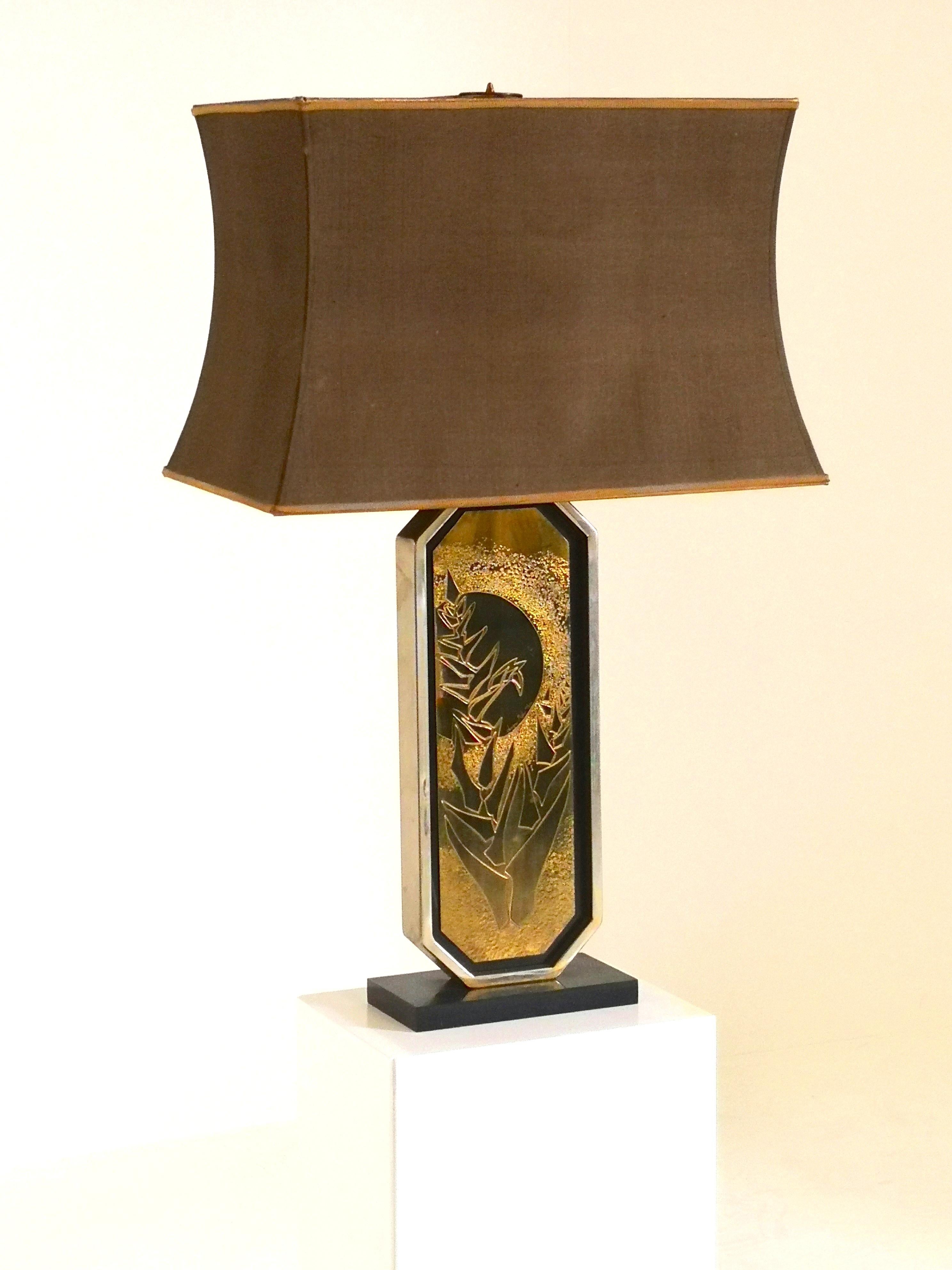 Mid-Century Modern George Mathias table lamp with original lamp shade, 1970s
It is a 23-karat gold-plated table lamp, engraved by hand and signed and numbered with edition no. 20 of 250.
The etched engraving is made on a 23-karat gold-plated plate