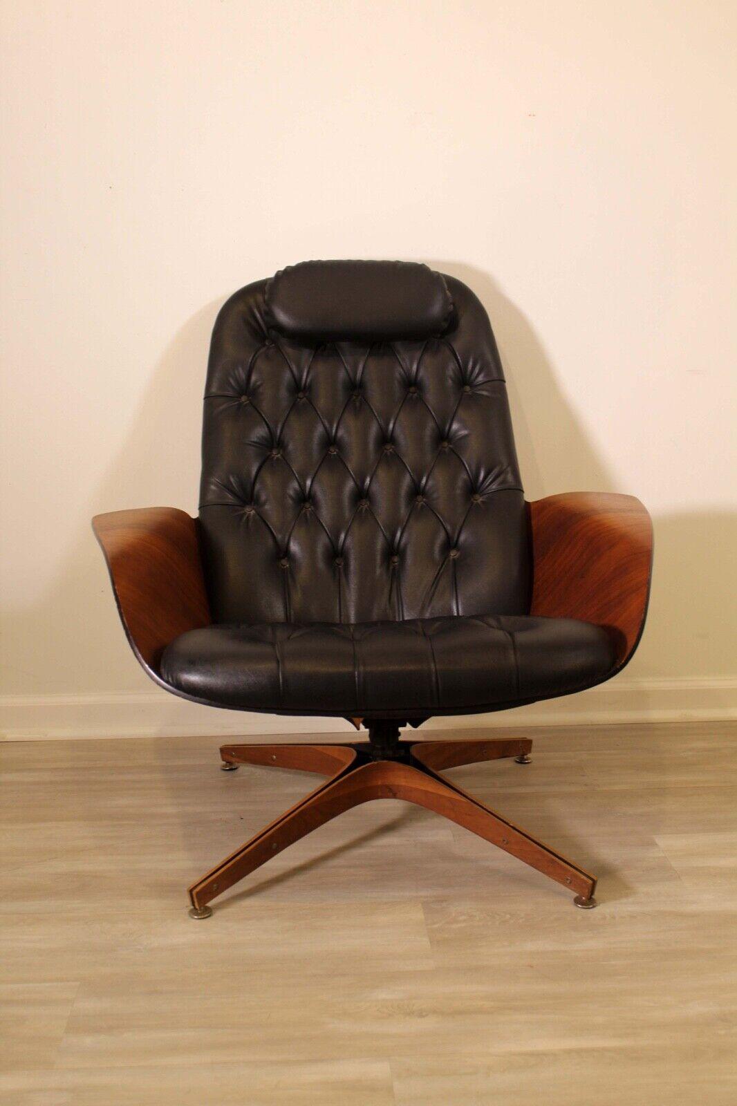An Iconic George Mulhauser Plycraft swivel chair up for consideration. In very good condition.

Dimensions: 36