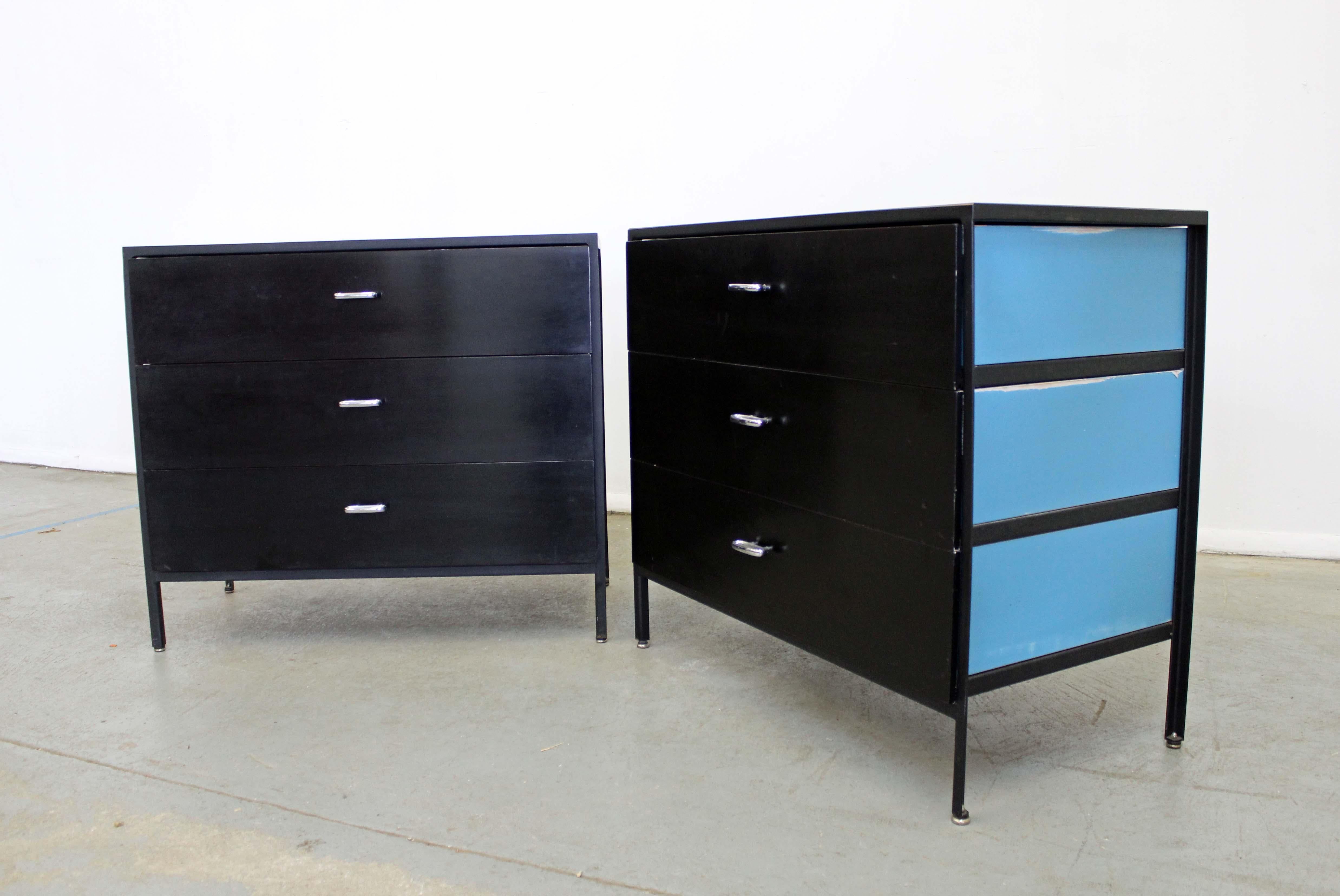 These dressers were designed by George Nelson for Herman Miller. They each have three drawers with chrome pulls, steel bases, and laminate tops.