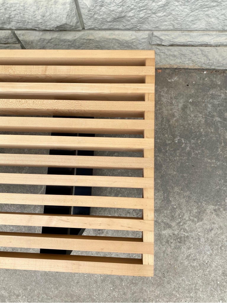 Mid-Century Modern natural maple platform slat bench by George Nelson for Herman Miller. This platform bench with finger-jointed wood base - remains as relevant today as it was in 1946, when George Nelson designed it. Nelson created its slatted top