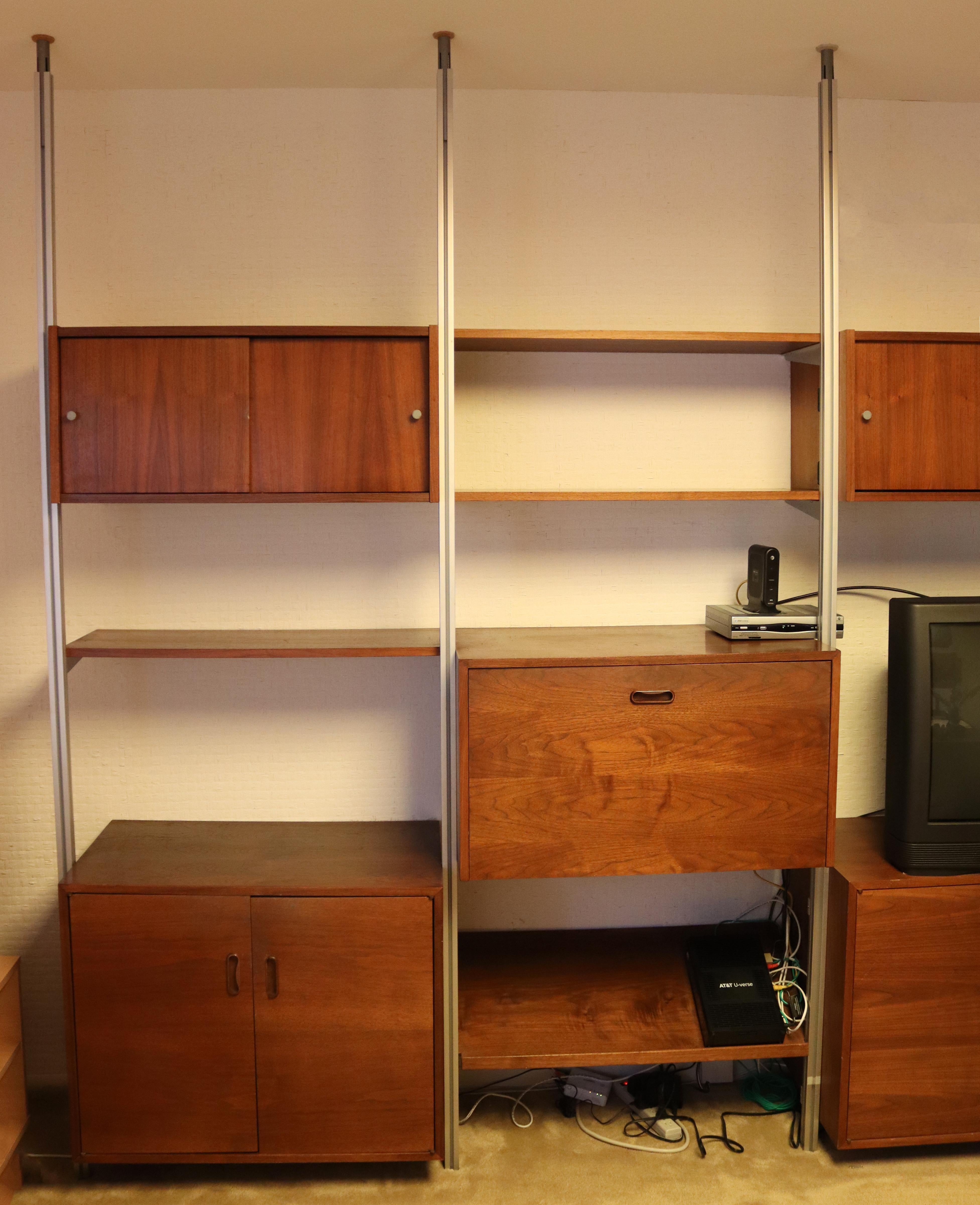 For your consideration is a phenomenal Omni wall unit, with three bays and tons of storage compartments, by George Nelson, circa the 1960s. In excellent vintage condition. Dimensions: 98