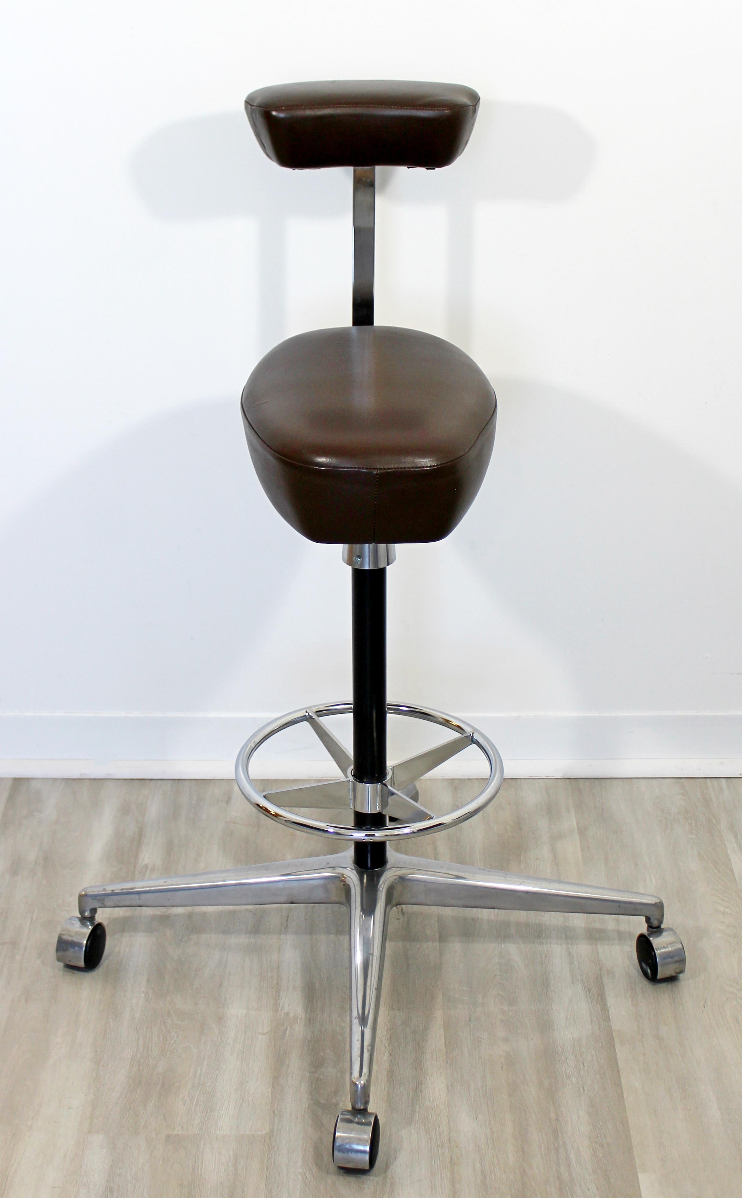 For your consideration is an original, brown leather, swivel drafting stool by Robert Probst & George Nelson for Herman Miller, circa 1960s. In excellent vintage condition. The dimensions of the base are 28