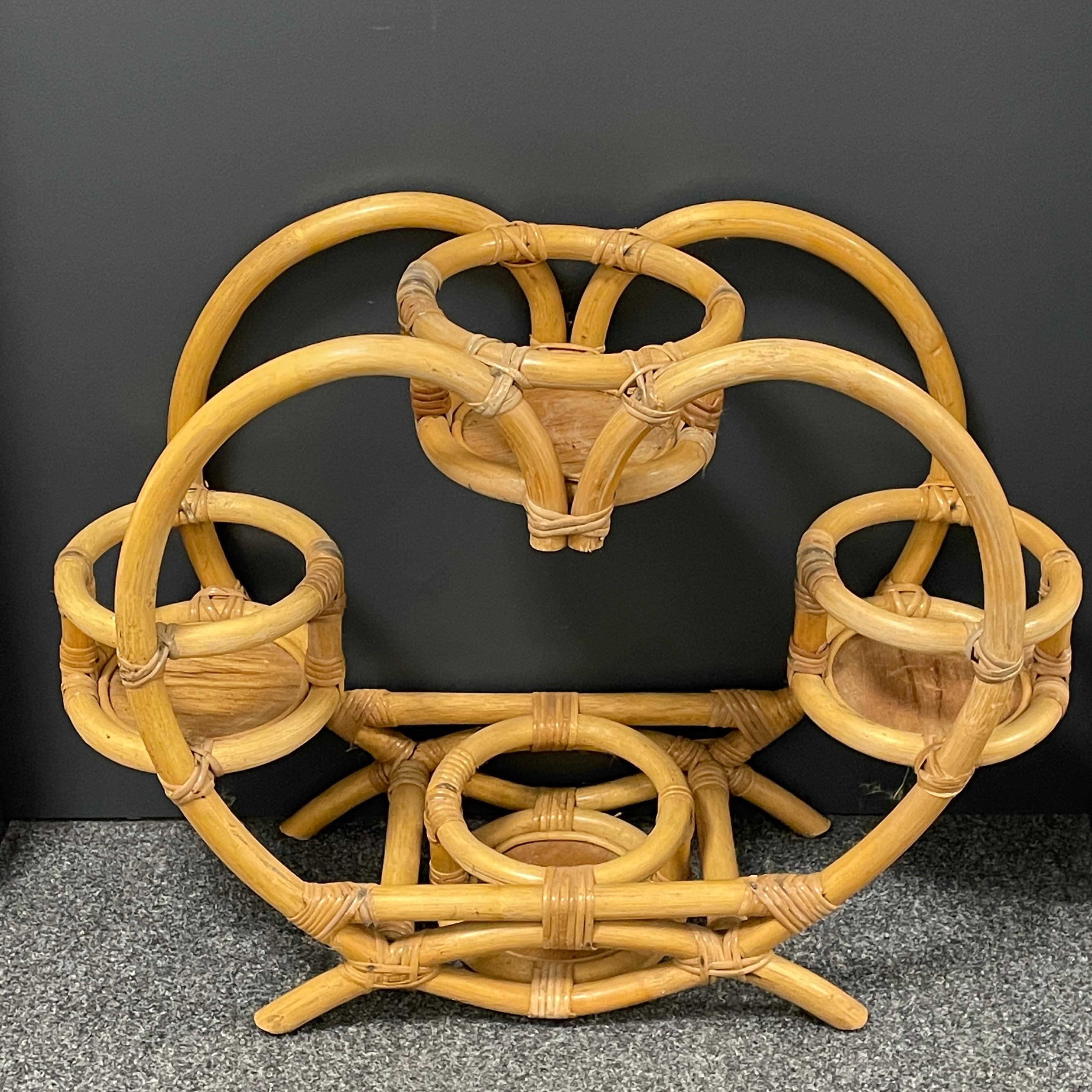 An amazing Mid-Century Modern plant stand, flower pot holder or shelf. Made in Germany, circa 1970s. This is a beautiful all original item in good condition. It has some signs of use, scratches to the wooden plates and patina to the wood, but this