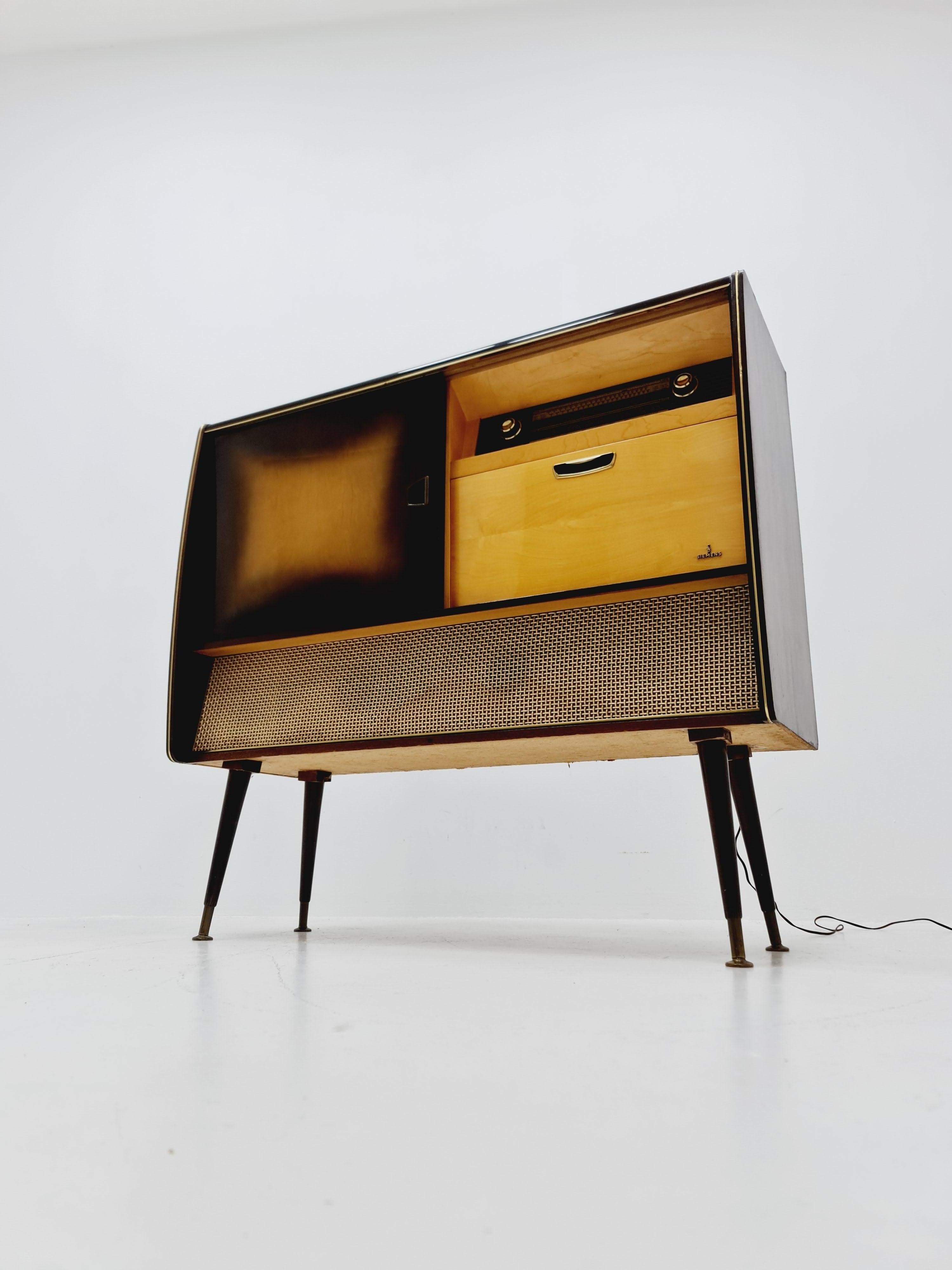 Wood Mid Century Modern German record player, radio by Siemens , 1950s For Sale