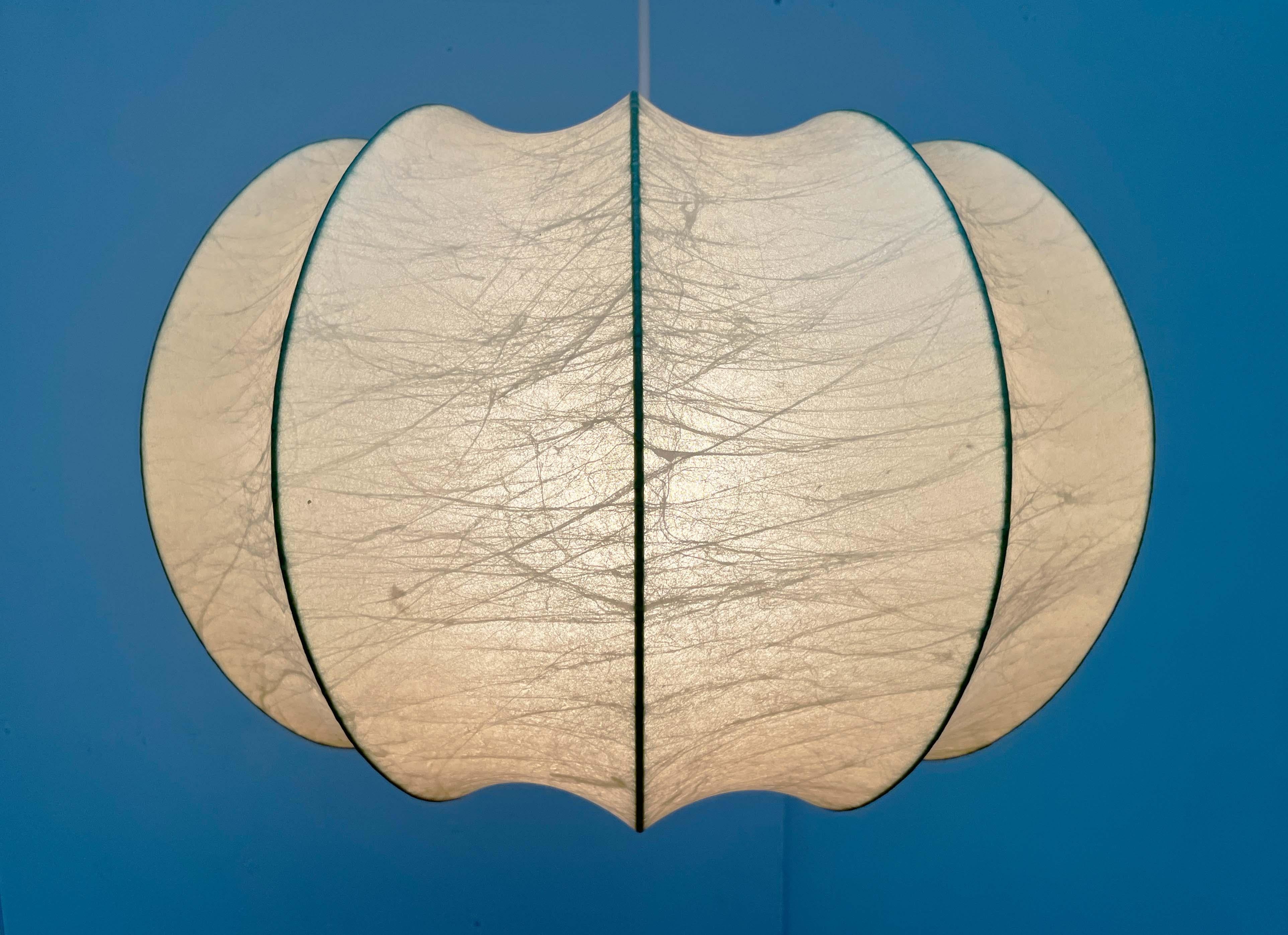 Rare mid-century Cocoon pendant light by Goldkant Leuchten, based on a design by Friedel Wauer from the 1960s.

The Cocoon material provides diffused, atmospheric light. At the same time, the symmetrical lamp body creates an impressive luminous