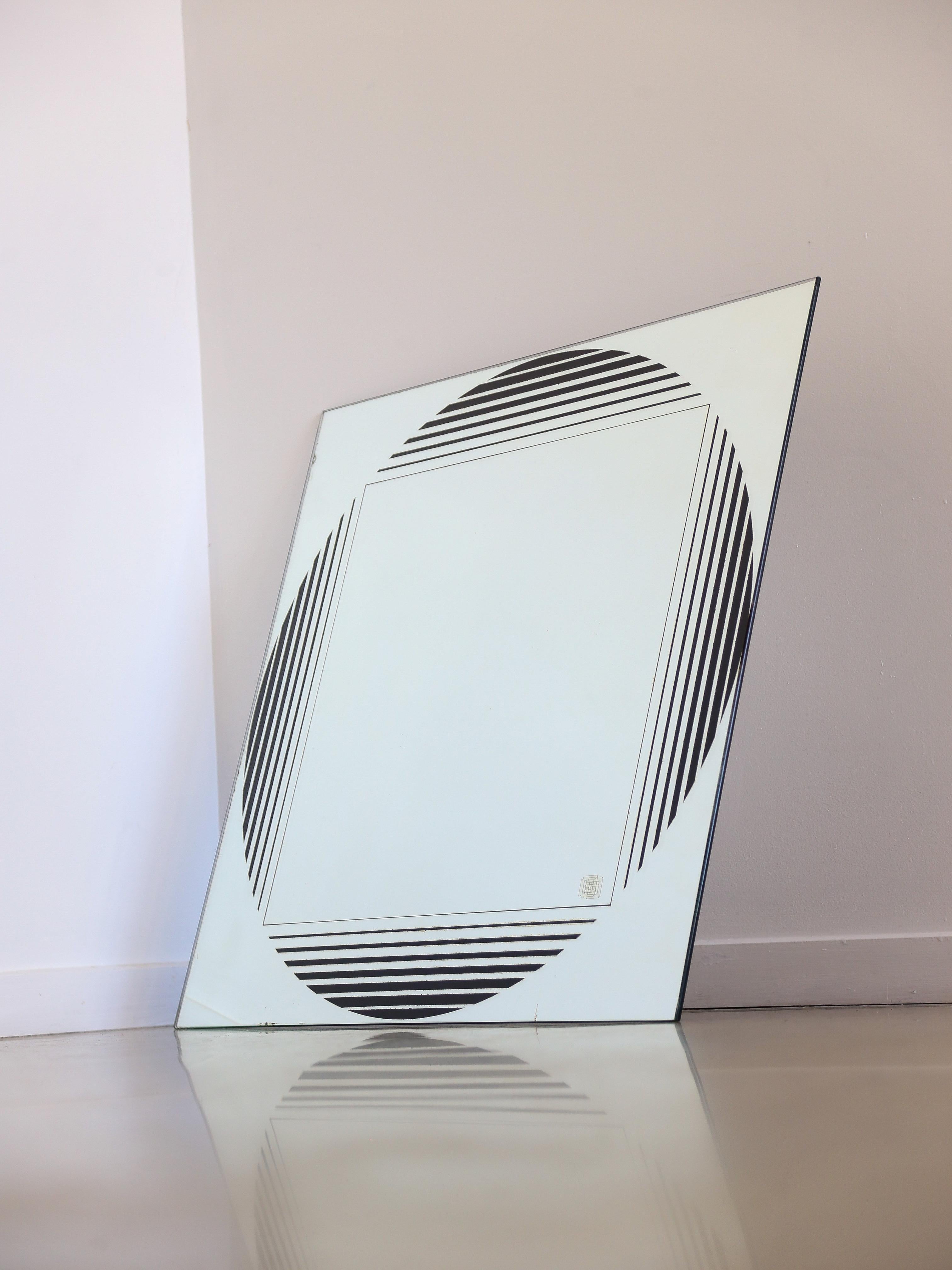 Gianni Celada for Fontana Arte wall mirror. 
Wall mirror by Gianni Celada for Fontana Arte, designed in '70s. The mirror has a screen printed decoration, geometrical black theme.
Published in: L. Falconi, 