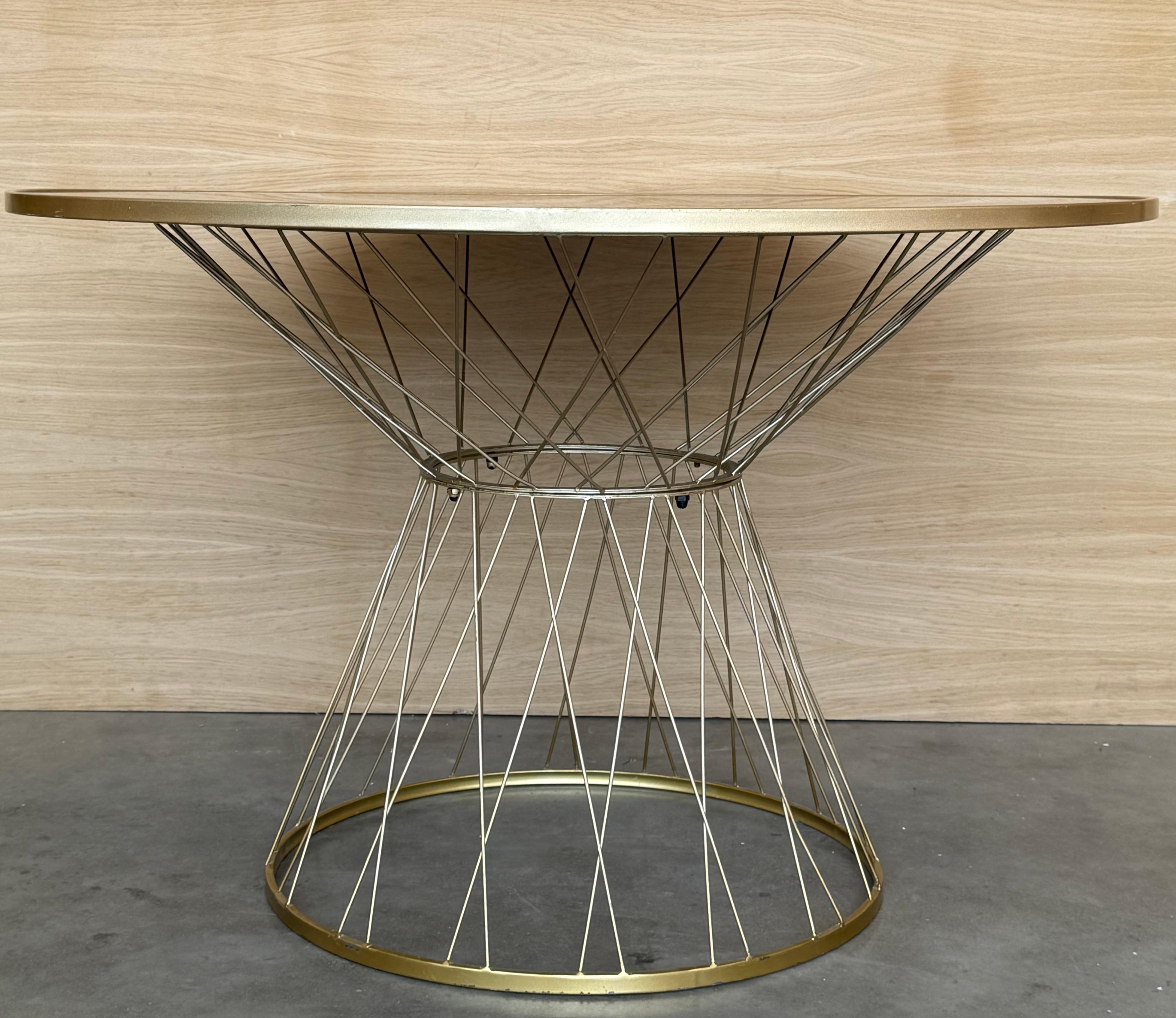 Woven seduction and polished glamour leave nothing to chance in the stunning Allure Style Dining Table. The beauty of the construction and a simple, shapely silhouette set the tone for moments of indulgence. A sophisticated glass top rests on the